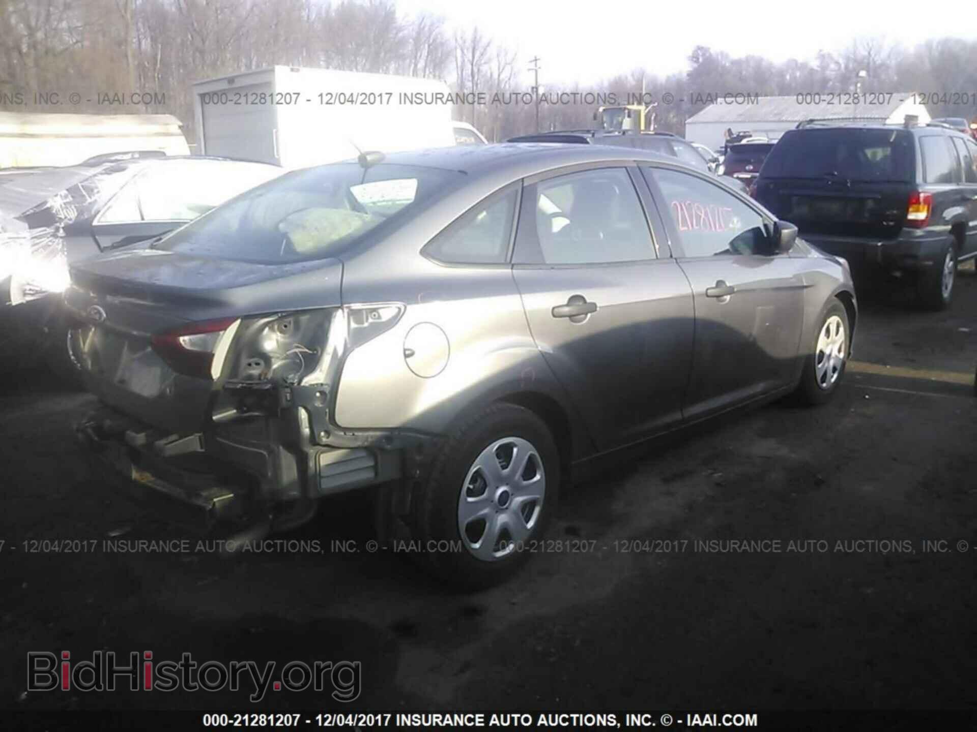 2013 Ford Focus - VIN: 1FADP3E25DL161026 - Photo 4