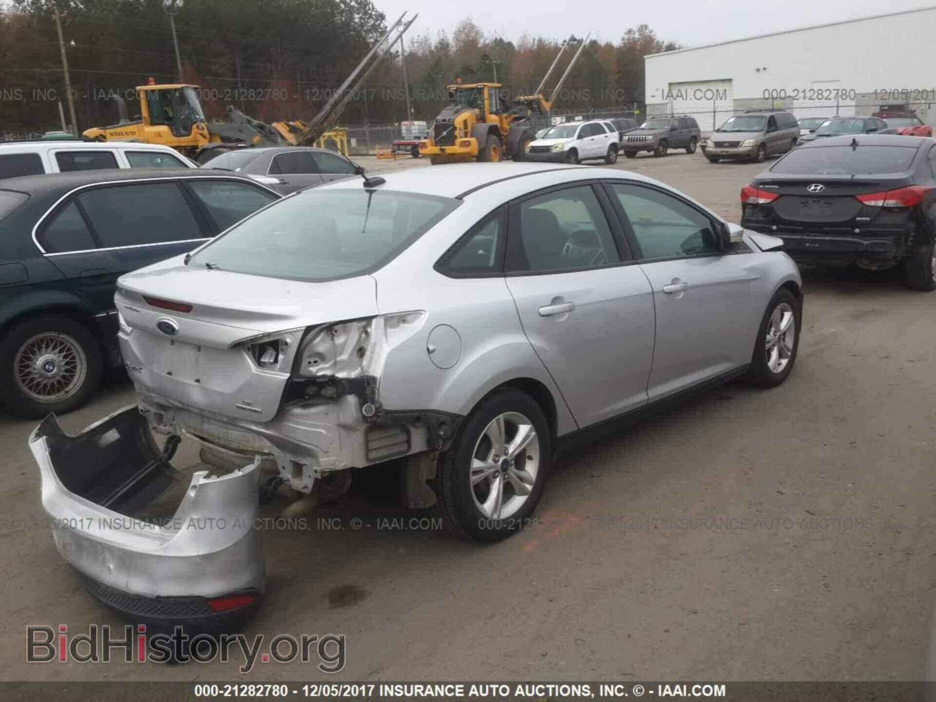 2014 Ford Focus - VIN: 1FADP3F22EL127965 - Photo 4