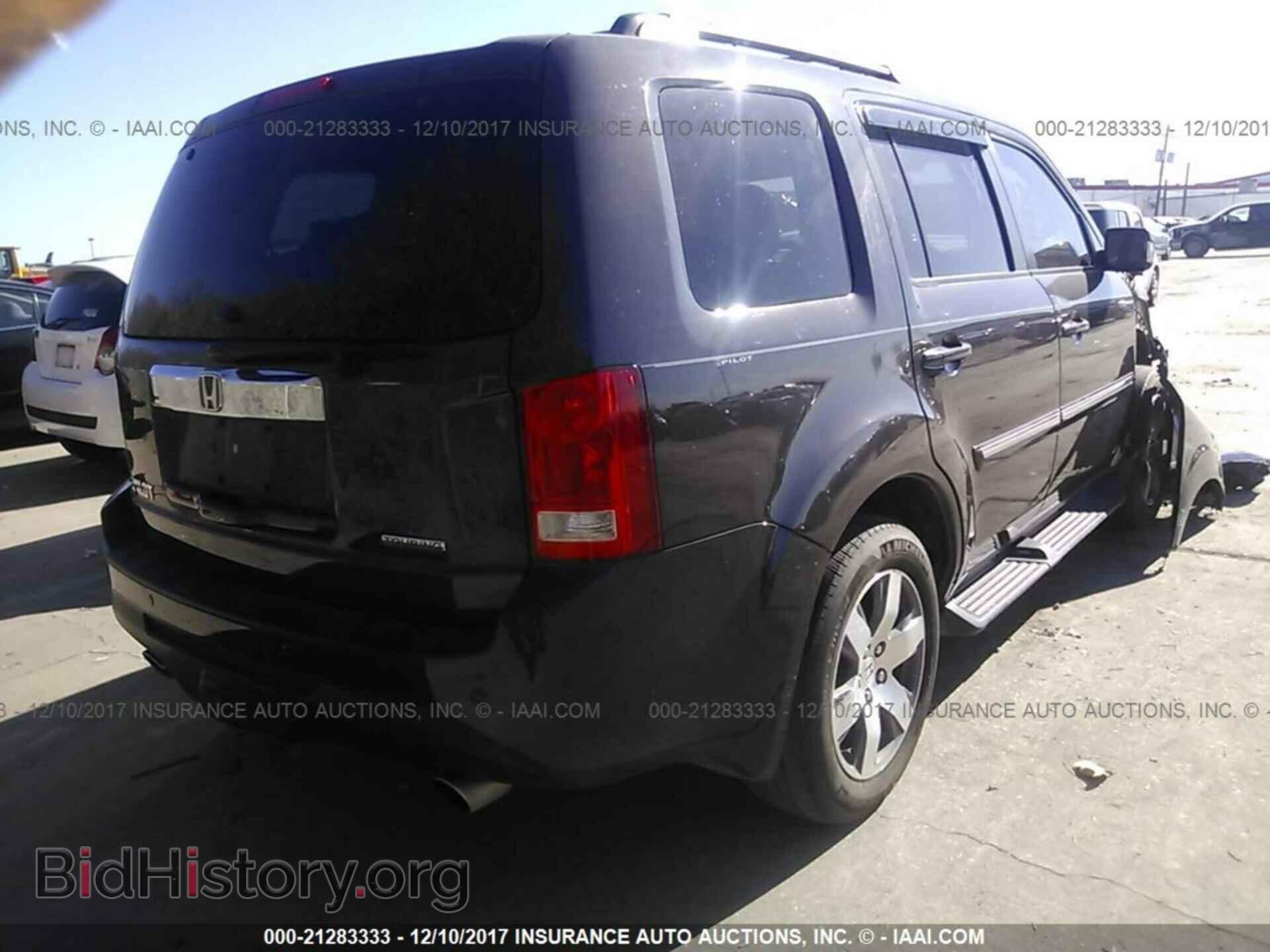 2014 Honda Pilot - VIN: 5FNYF3H91EB014701 - Photo 4