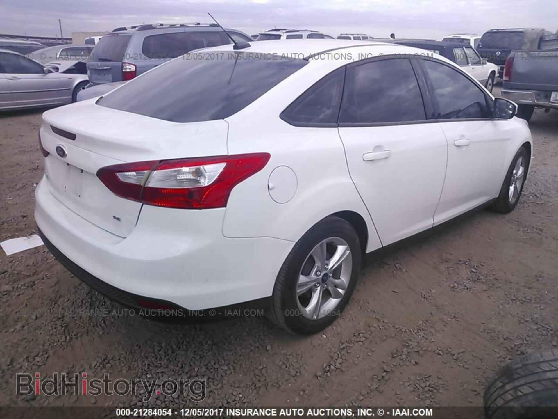 2014 Ford Focus - VIN: 1FADP3F2XEL210821 - Photo 4