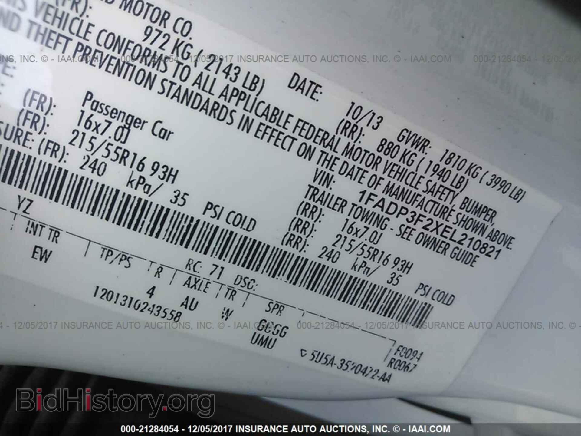 2014 Ford Focus - VIN: 1FADP3F2XEL210821 - Photo 9