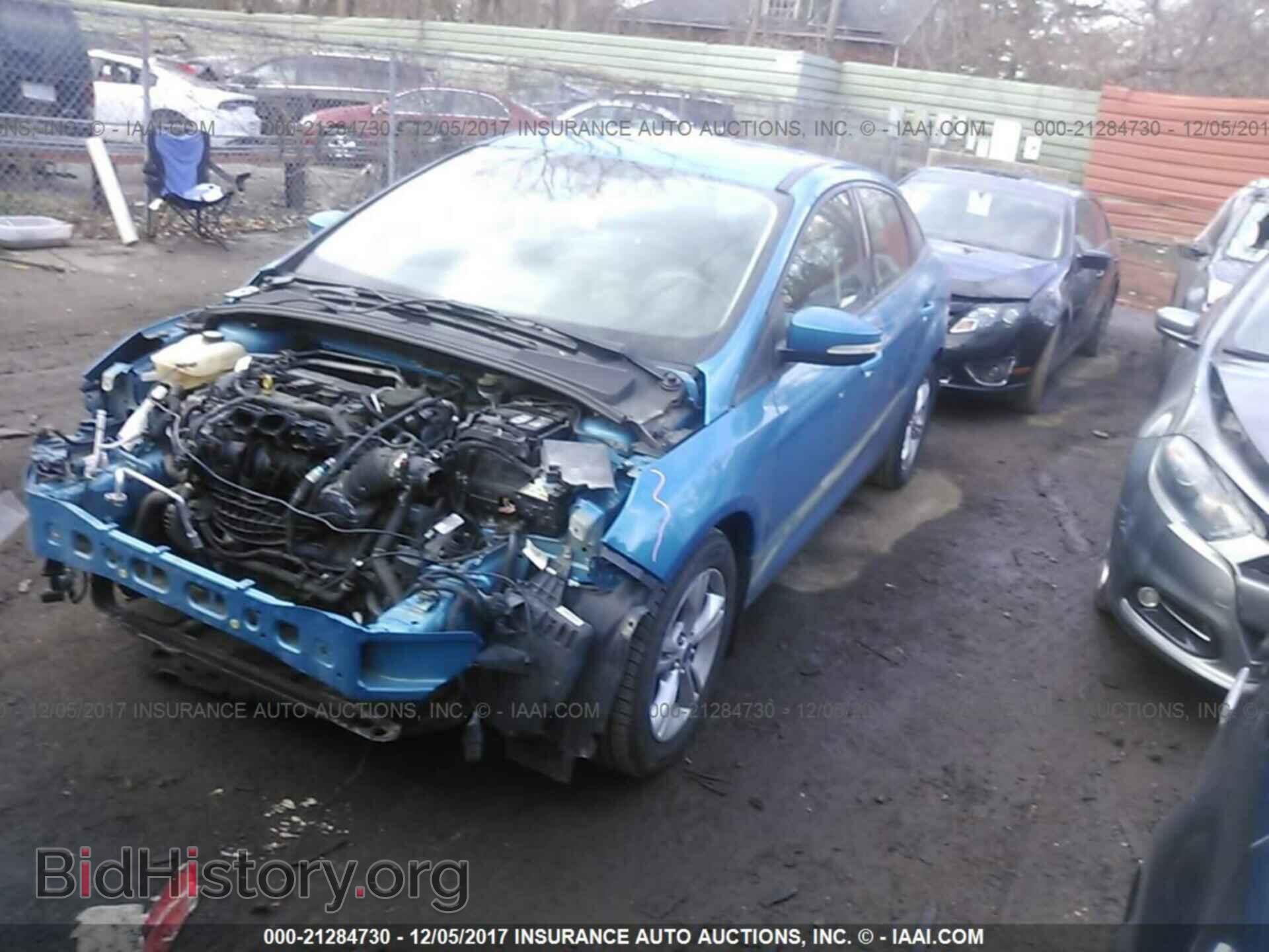 2013 Ford Focus - VIN: 1FADP3F2XDL324493 - Фото 2