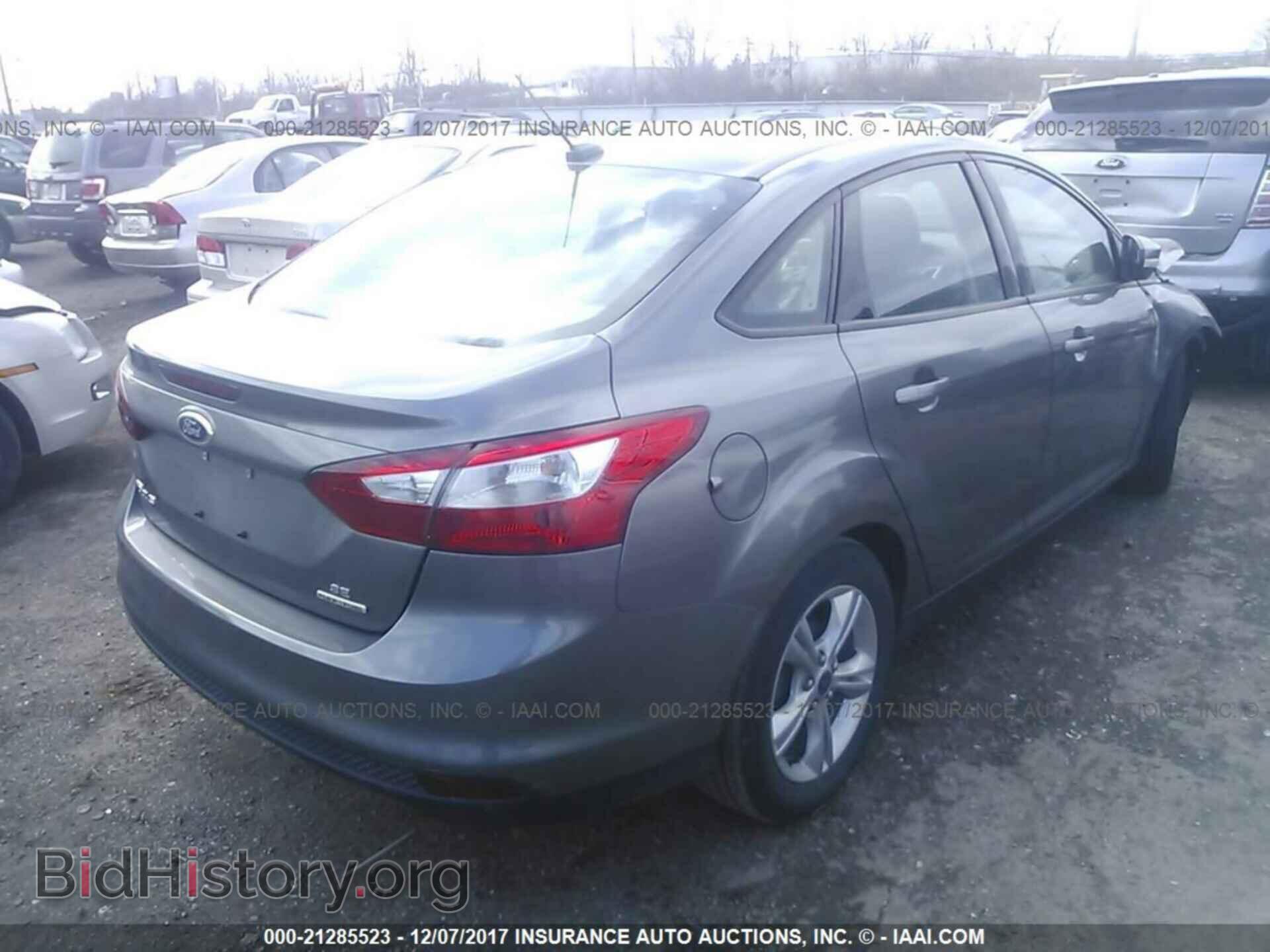 2014 Ford Focus - VIN: 1FADP3F22EL182108 - Photo 4
