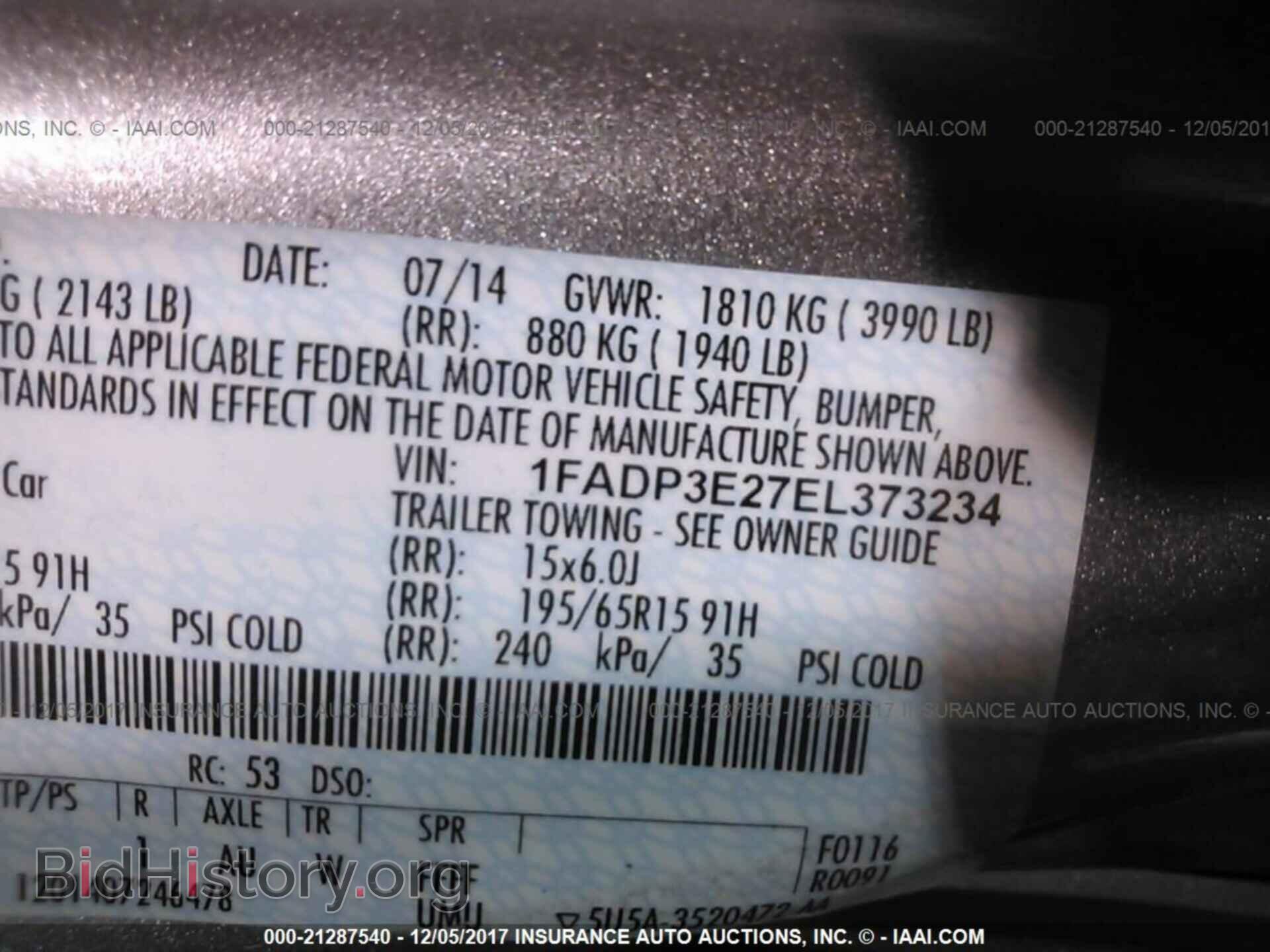 2014 Ford Focus - VIN: 1FADP3E27EL373234 - Photo 9