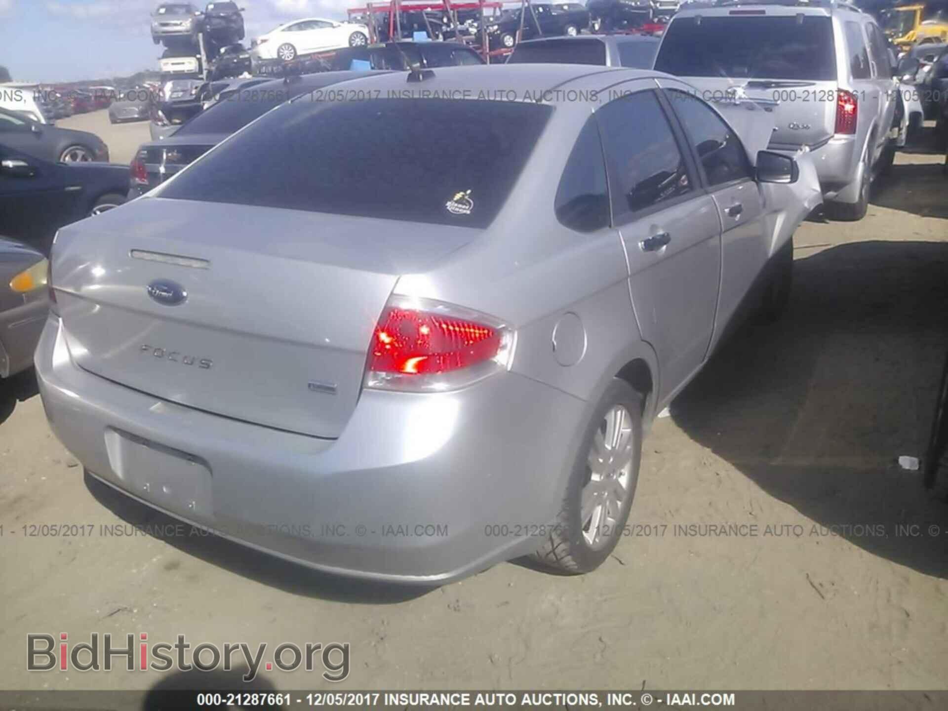 2011 Ford Focus - VIN: 1FAHP3HN0BW169165 - Фото 4