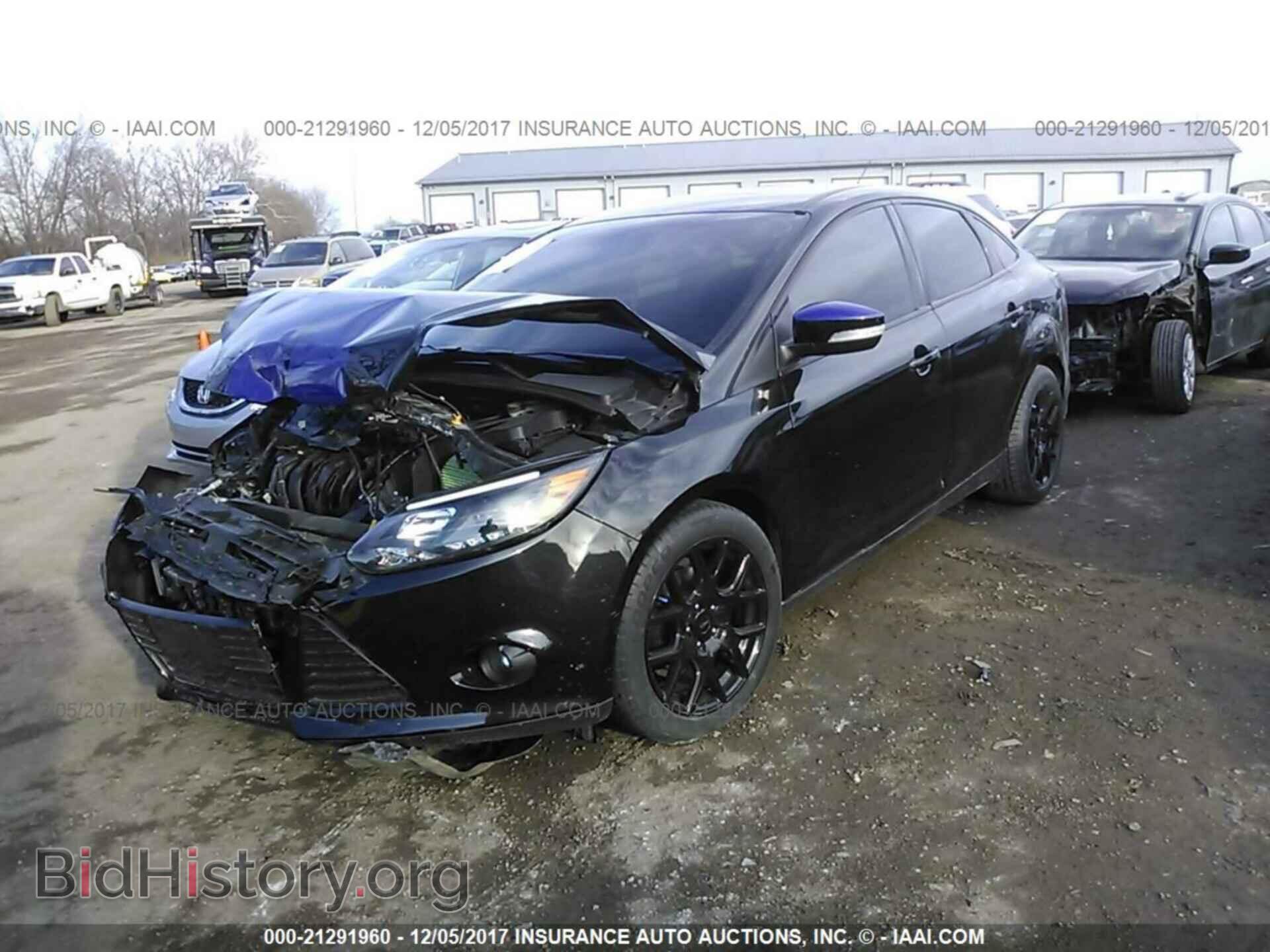 2014 Ford Focus - VIN: 1FADP3F26EL357850 - Photo 2