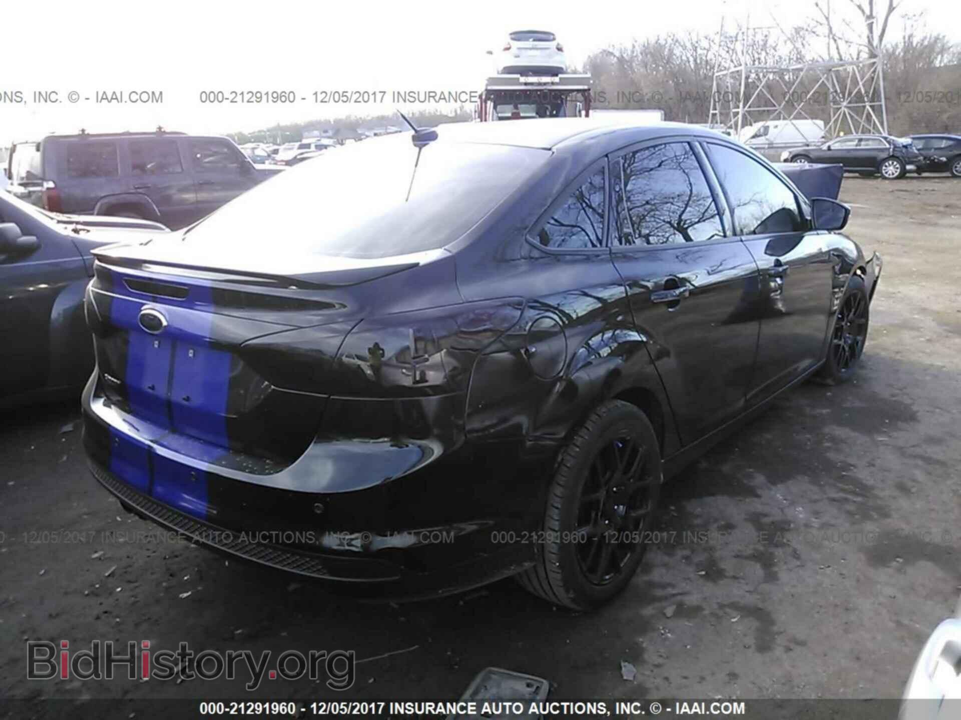 2014 Ford Focus - VIN: 1FADP3F26EL357850 - Photo 4