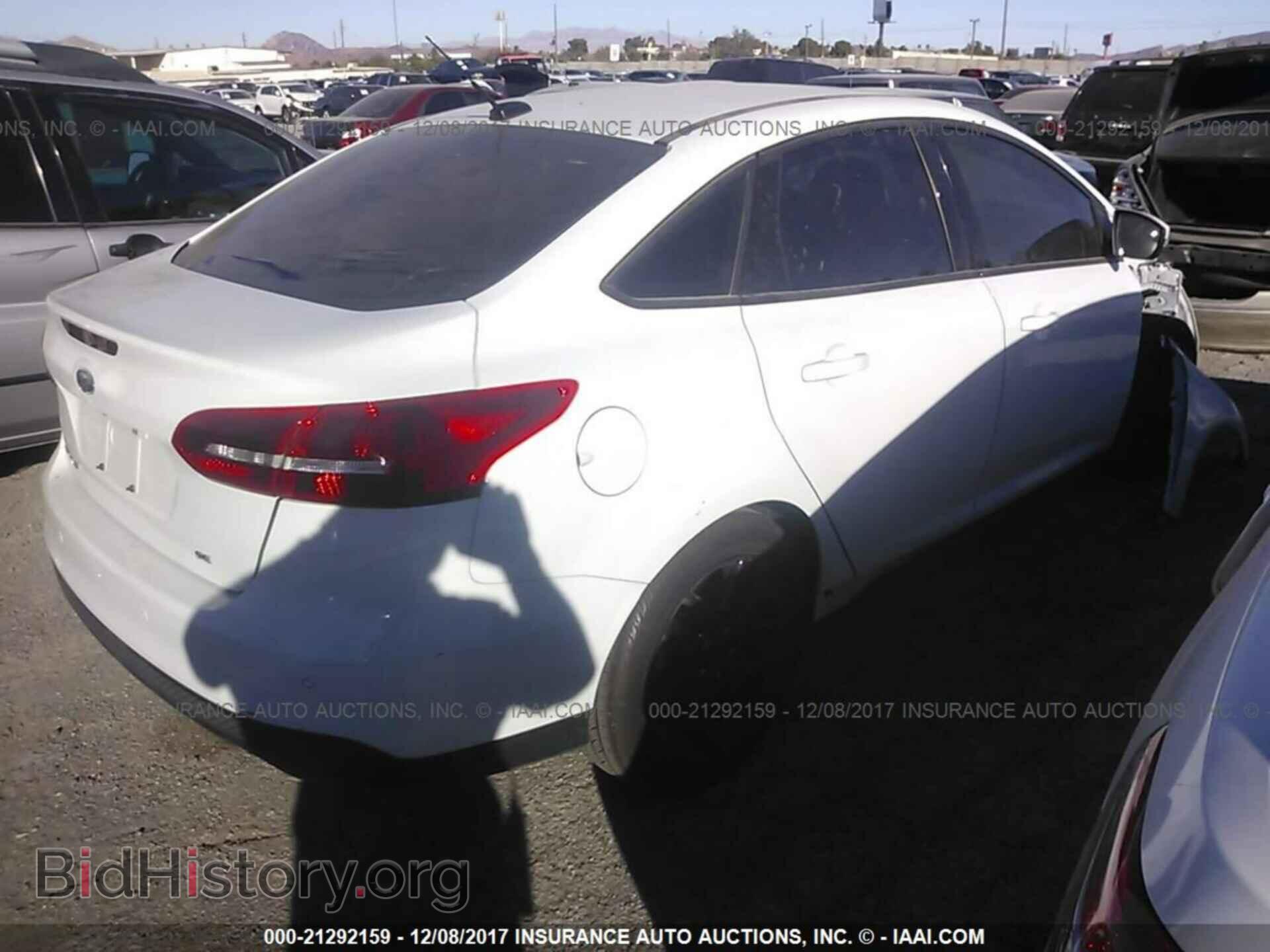 2016 Ford Focus - VIN: 1FADP3F24GL291382 - Фото 4