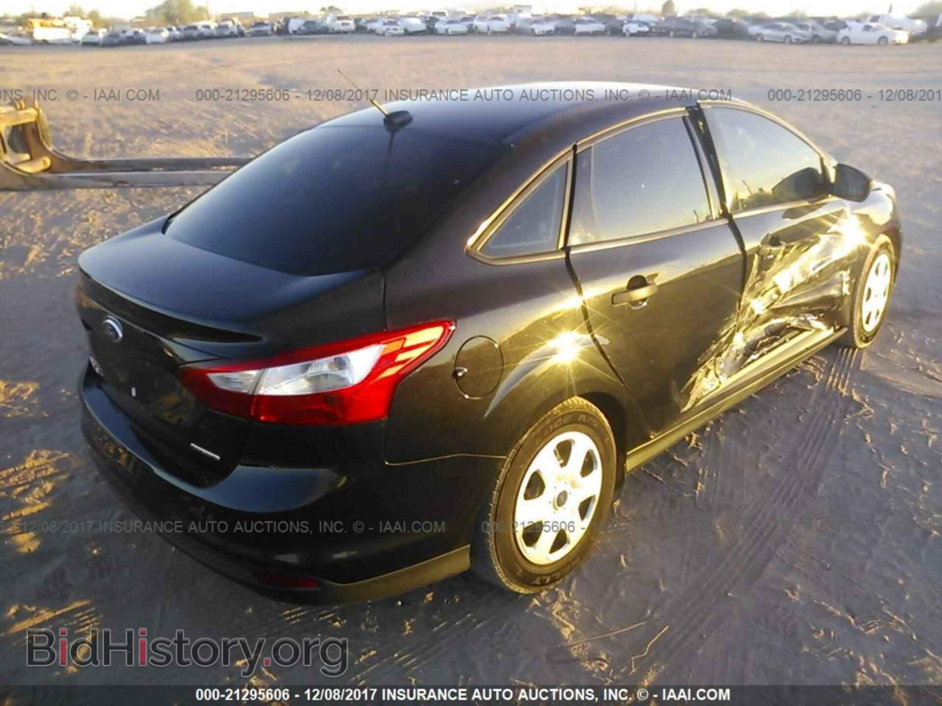 2014 Ford Focus - VIN: 1FADP3E24EL294362 - Photo 4