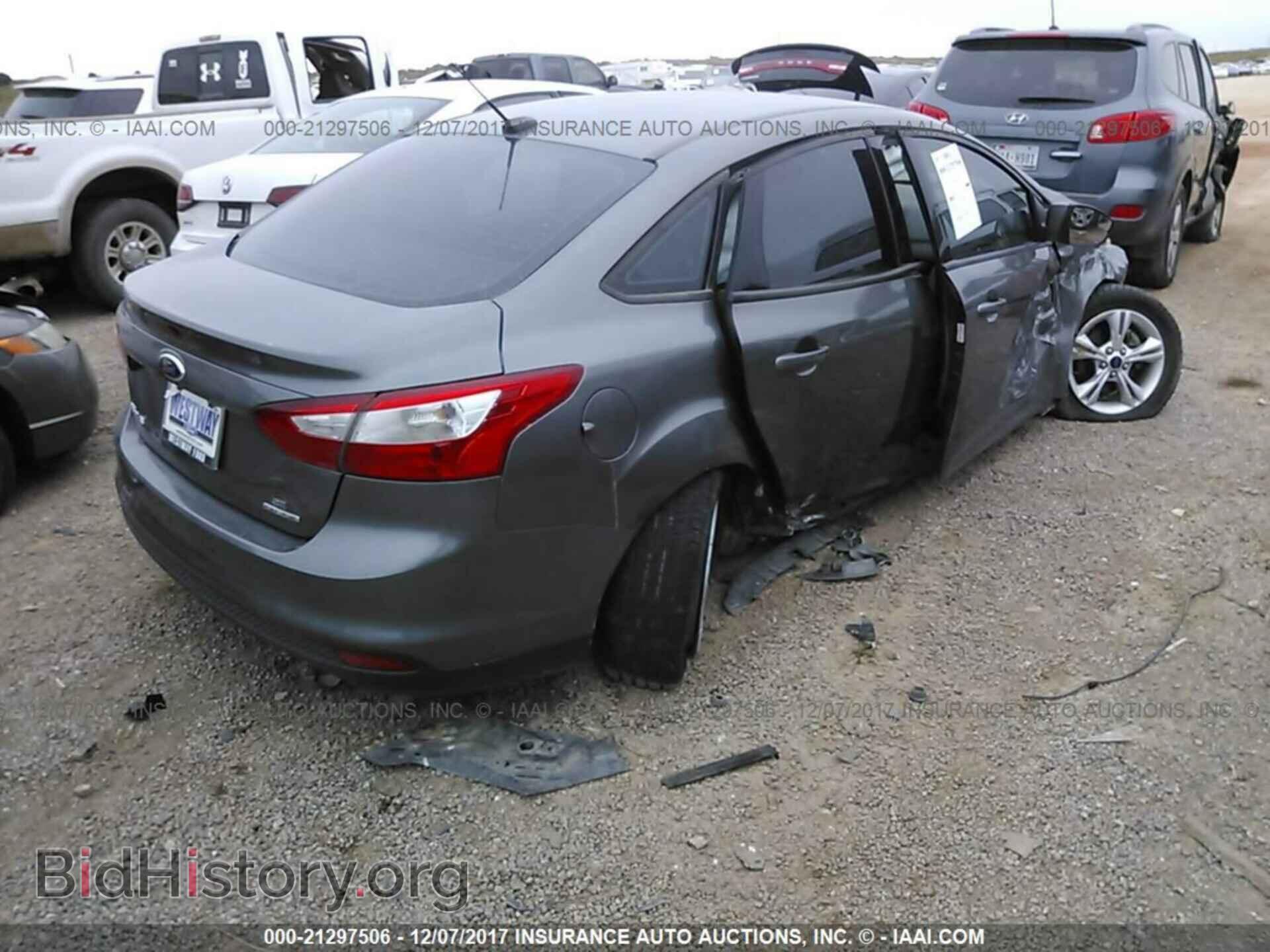 2013 Ford Focus - VIN: 1FADP3F24DL176664 - Фото 4