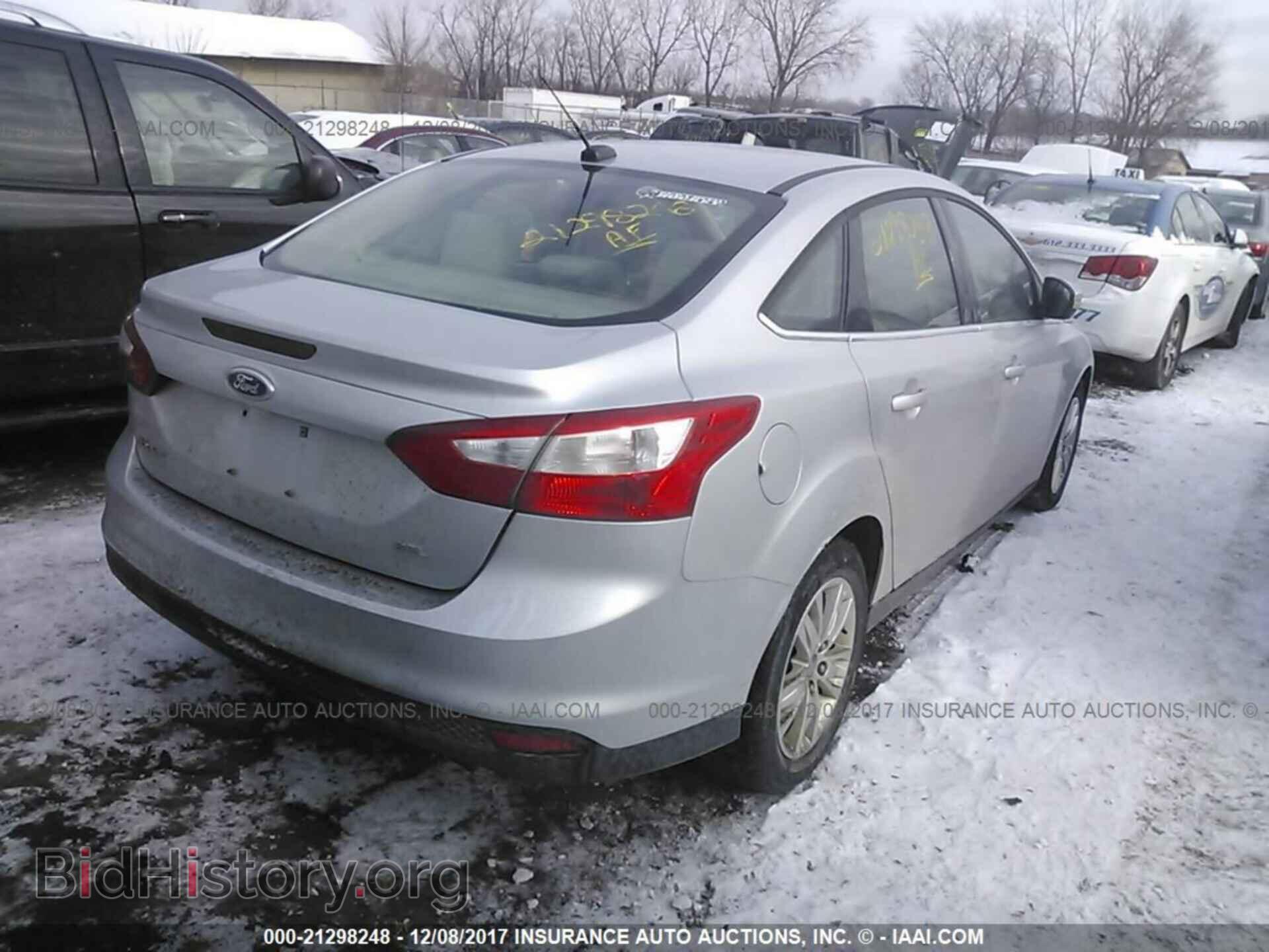 2012 Ford Focus - VIN: 1FAHP3H20CL197637 - Фото 4