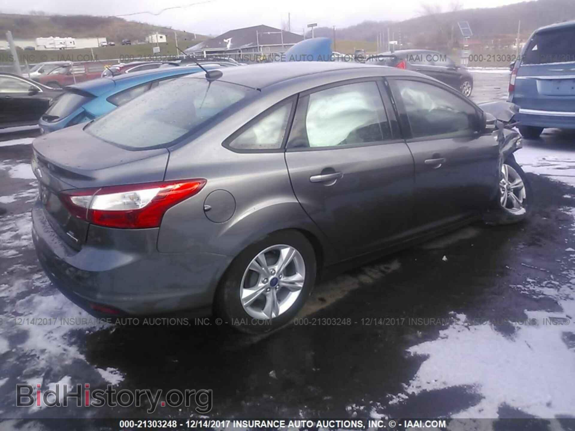 2014 Ford Focus - VIN: 1FADP3F25EL136448 - Фото 4