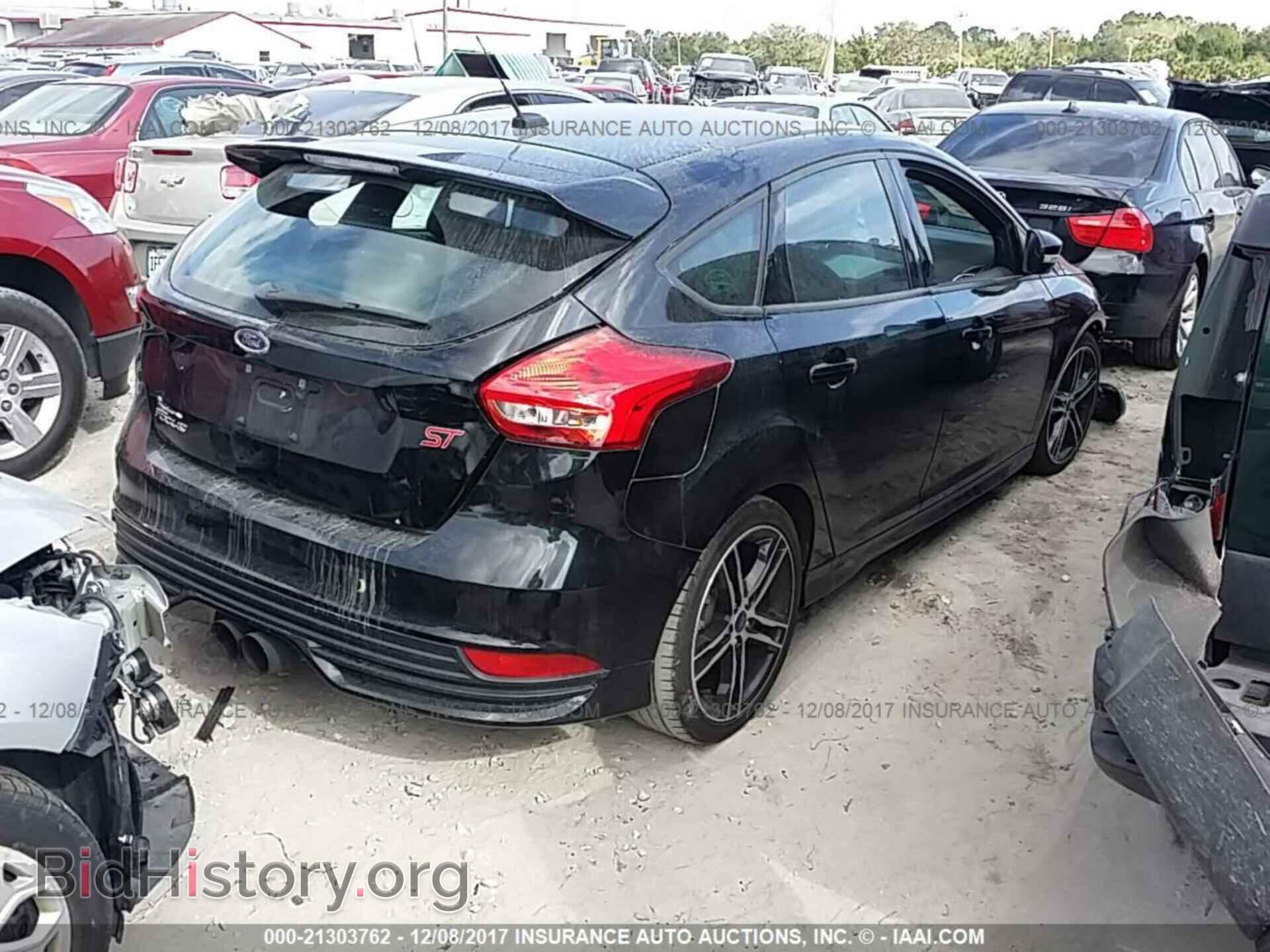 2016 Ford Focus - VIN: 1FADP3L97GL292690 - Photo 4