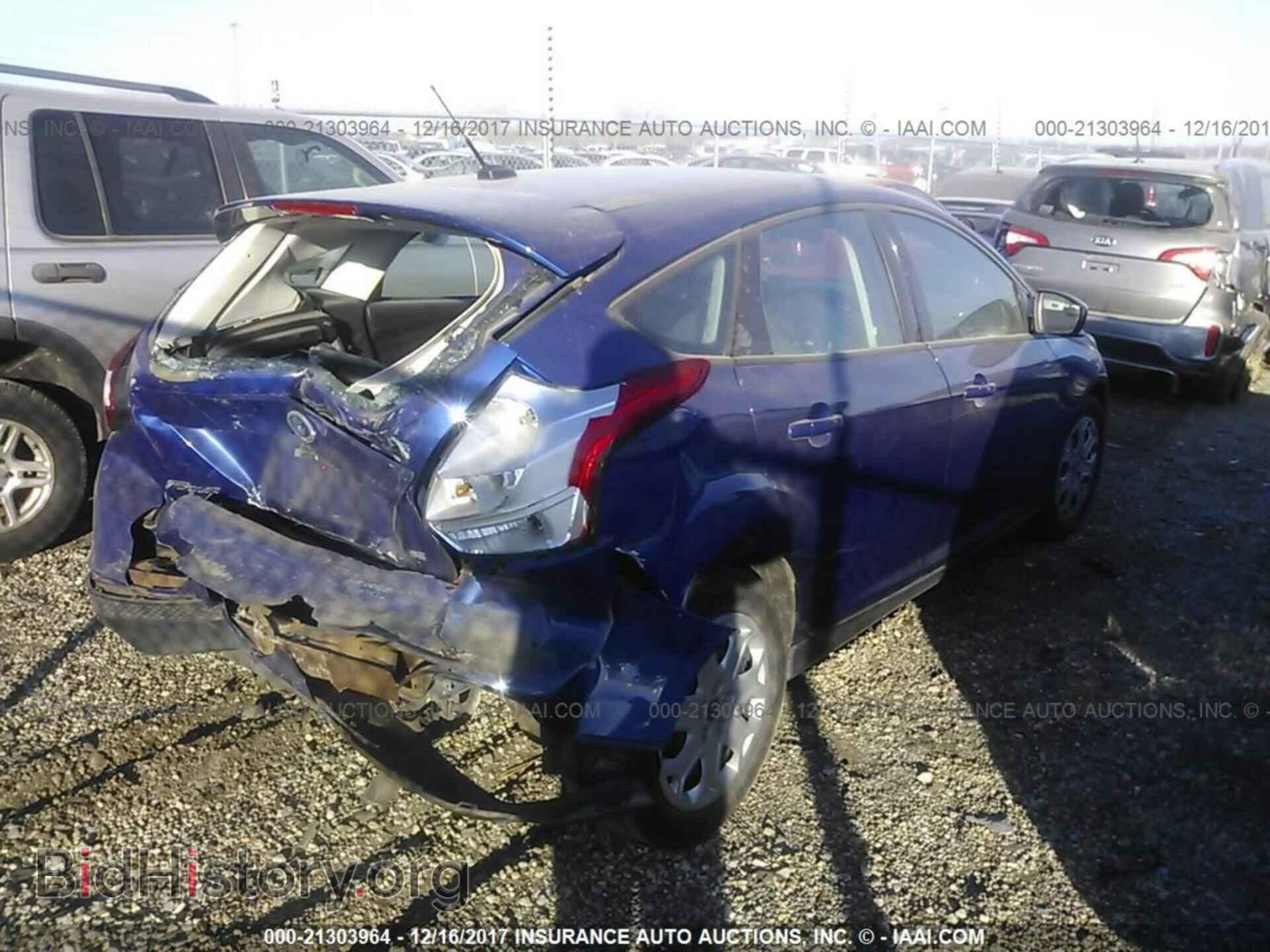 2012 Ford Focus - VIN: 1FAHP3K23CL319271 - Photo 4