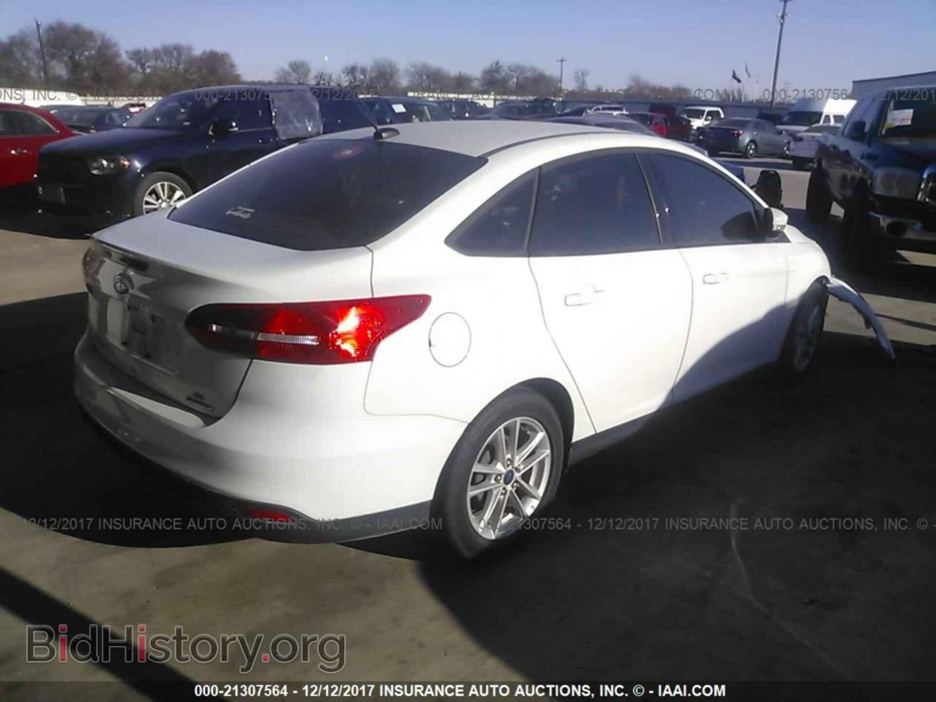 2015 Ford Focus - VIN: 1FADP3F21FL234541 - Photo 4