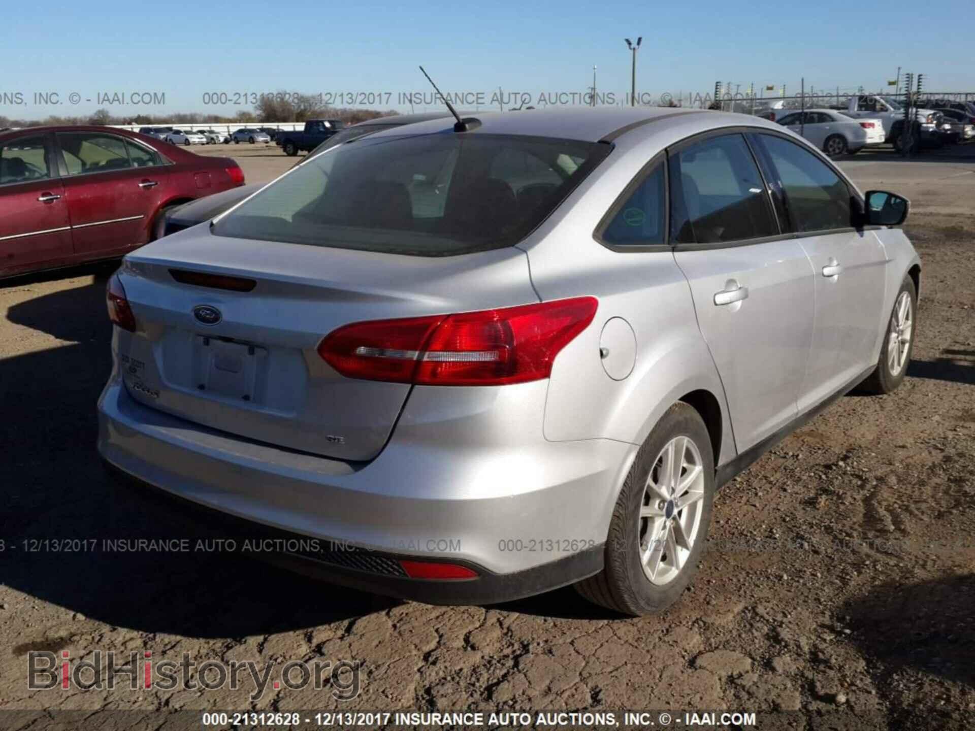 2017 Ford Focus - VIN: 1FADP3F2XHL204974 - Photo 4