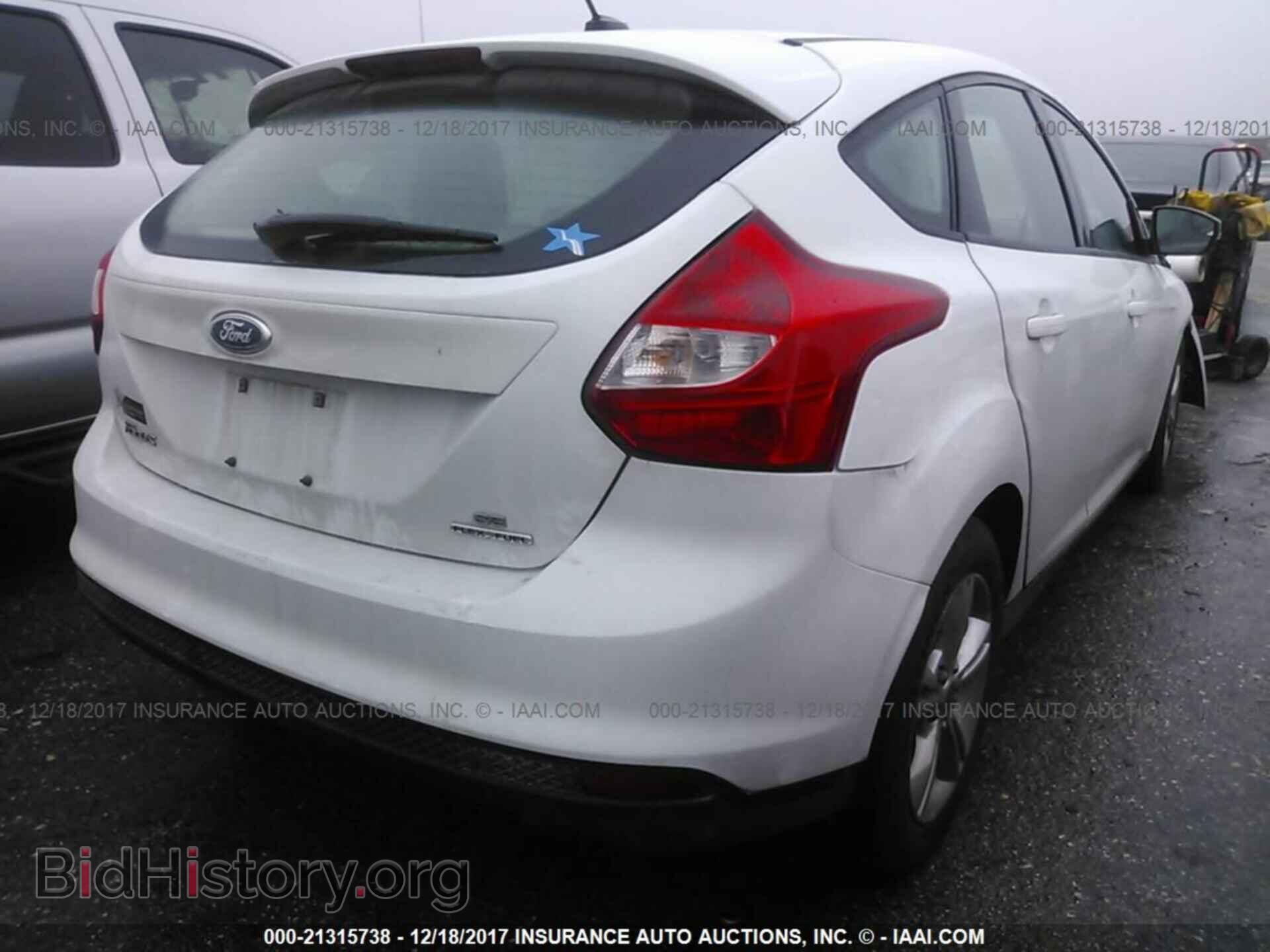 2014 Ford Focus - VIN: 1FADP3K25EL158259 - Photo 4