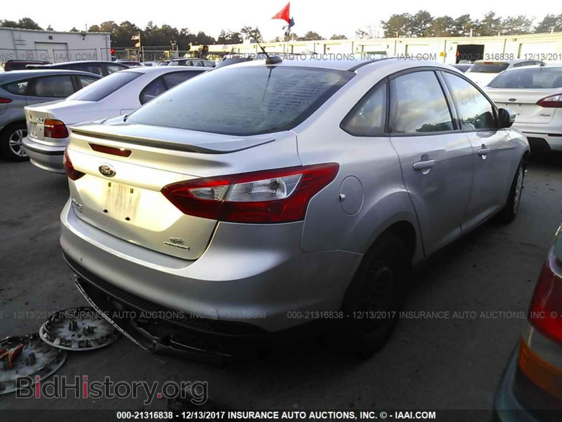 2013 Ford Focus - VIN: 1FADP3F29DL141568 - Photo 4