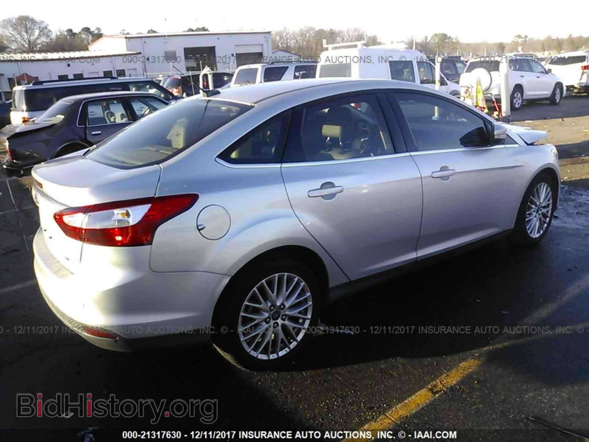 2012 Ford Focus - VIN: 1FAHP3H28CL315076 - Фото 4