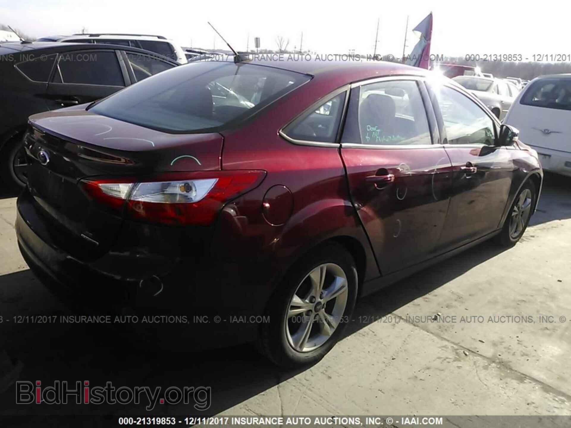 2014 Ford Focus - VIN: 1FADP3F2XEL117863 - Photo 4