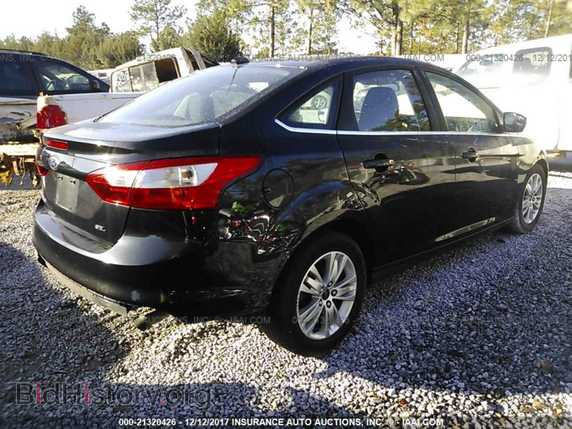 2012 Ford Focus - VIN: 1FAHP3H28CL395897 - Фото 4