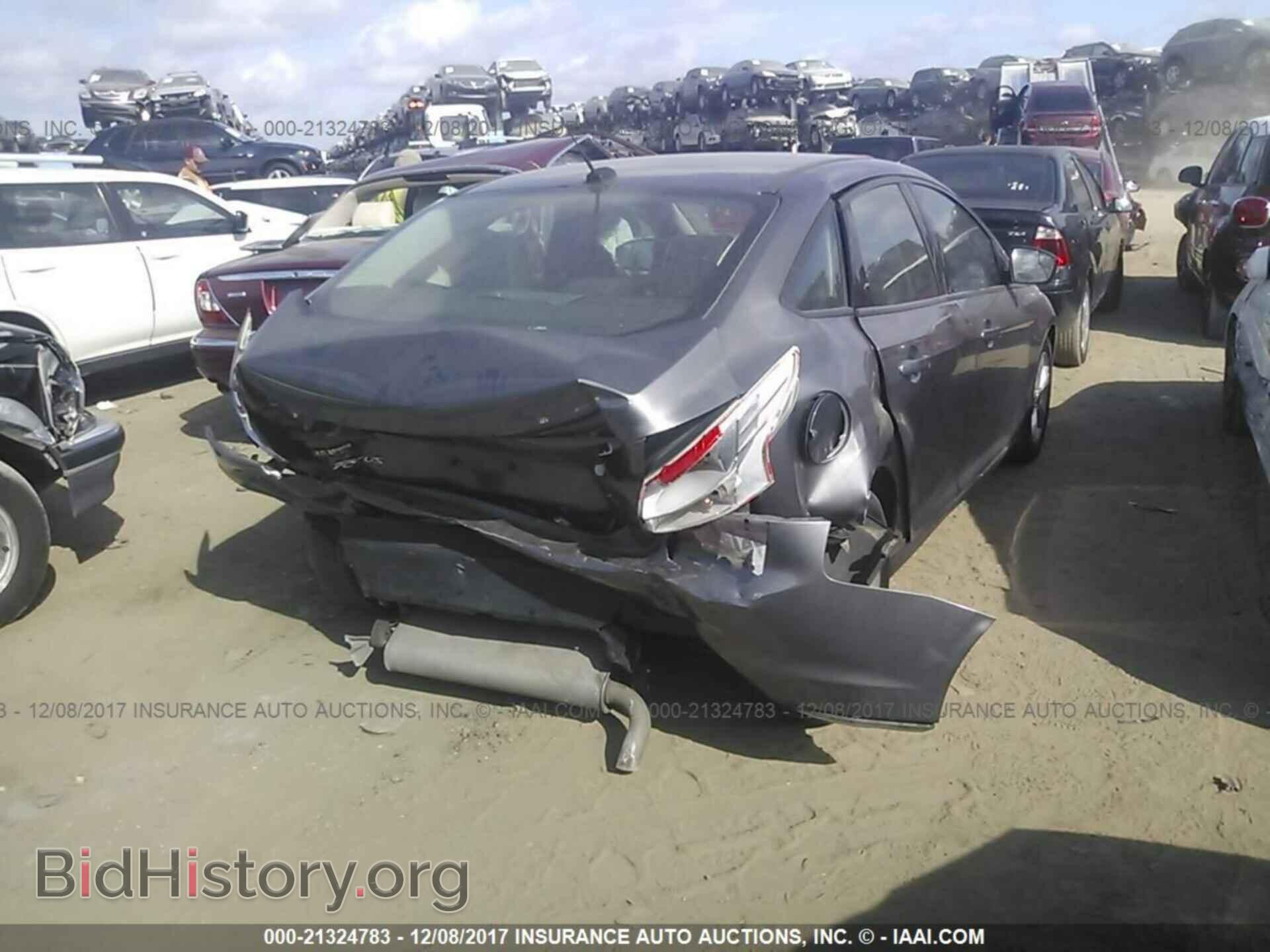 2014 Ford Focus - VIN: 1FADP3F20EL232438 - Photo 4