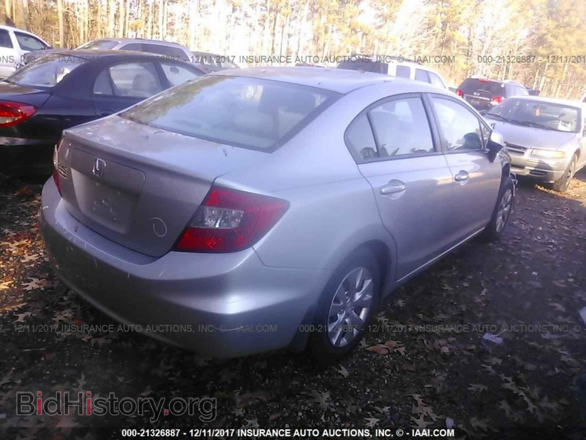 2012 Honda Civic - VIN: 2HGFB2F55CH548922 - Photo 4