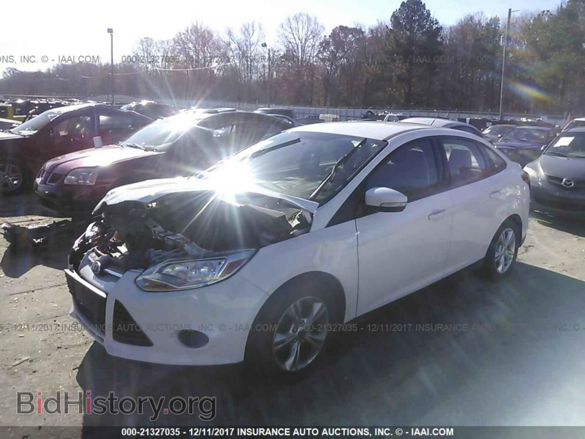 2014 Ford Focus - VIN: 1FADP3F26EL102776 - Photo 2
