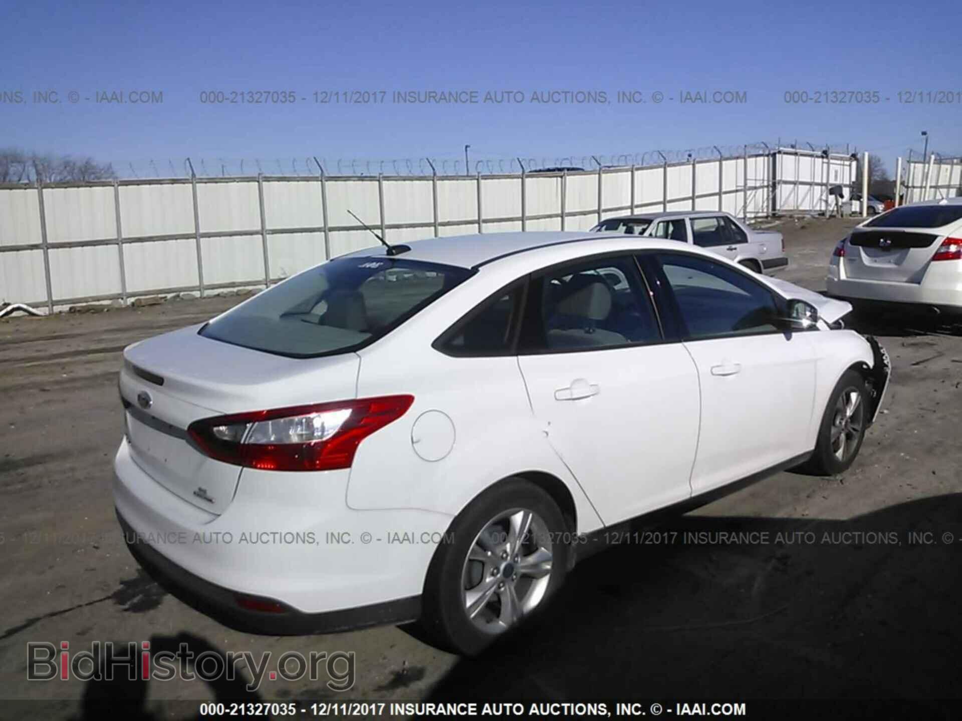 2014 Ford Focus - VIN: 1FADP3F26EL102776 - Photo 4