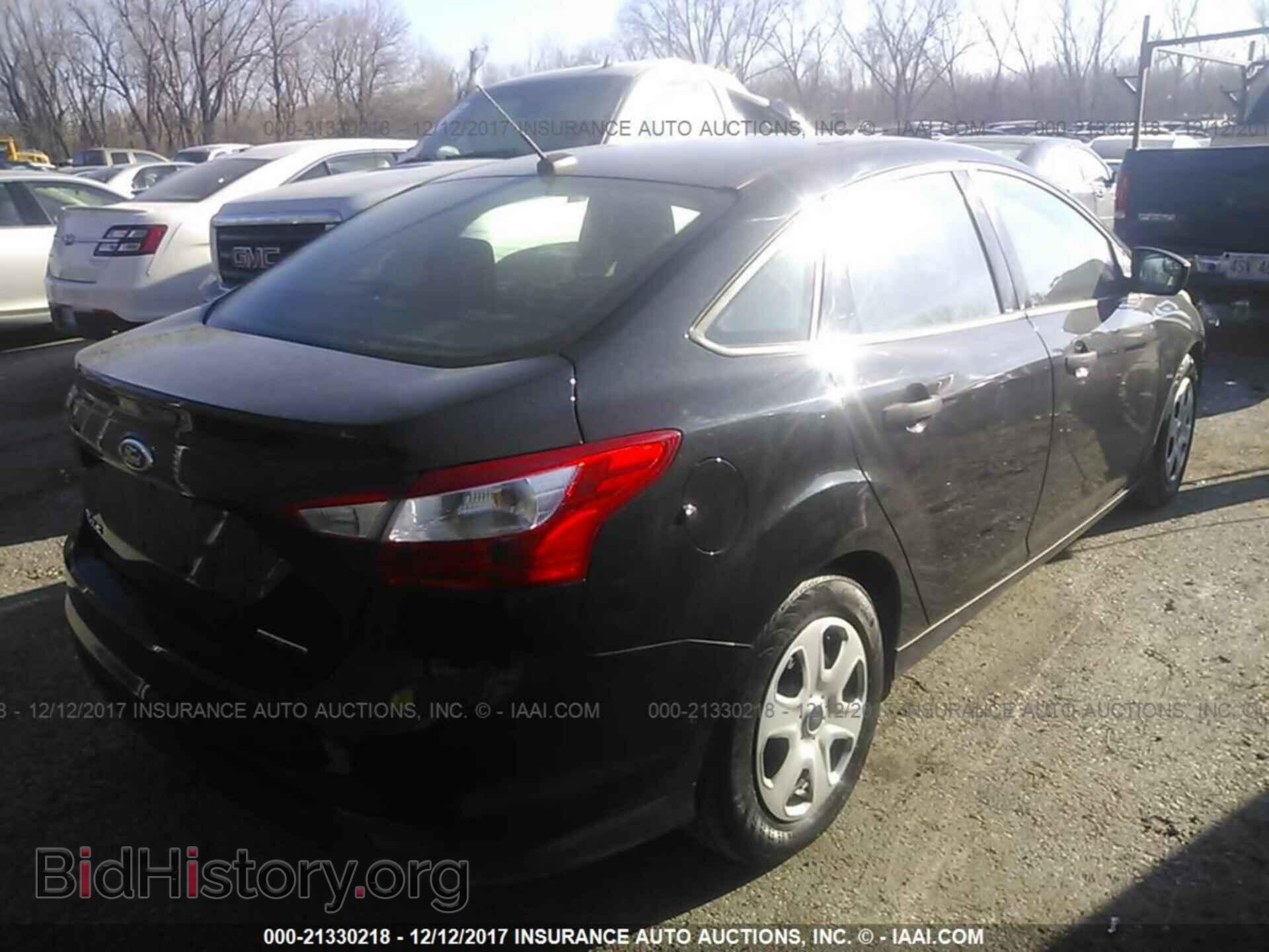 2014 Ford Focus - VIN: 1FADP3E22EL225833 - Photo 4