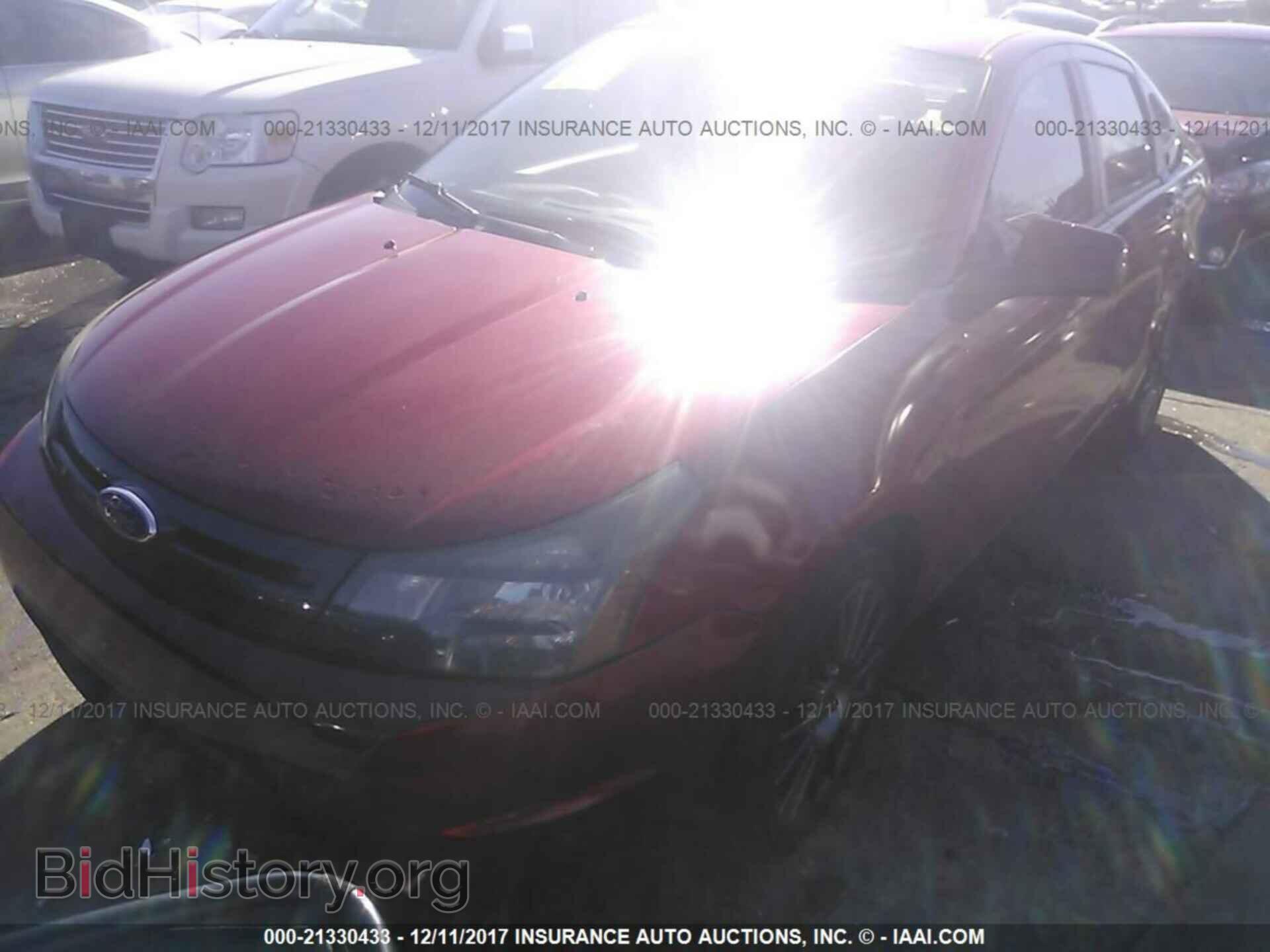 2011 Ford Focus - VIN: 1FAHP3GN8BW115176 - Фото 2