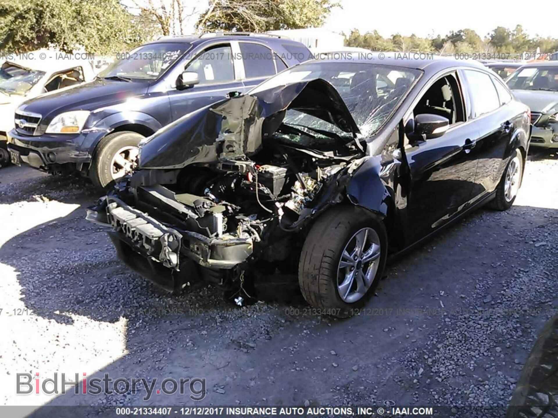 2014 Ford Focus - VIN: 1FADP3F24EL213858 - Photo 2