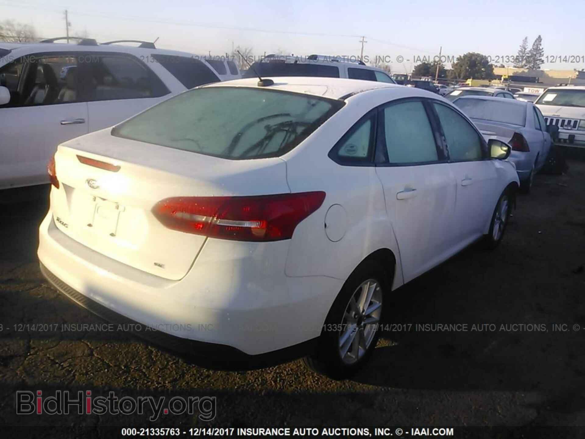 2015 Ford Focus - VIN: 1FADP3F23FL203792 - Photo 4