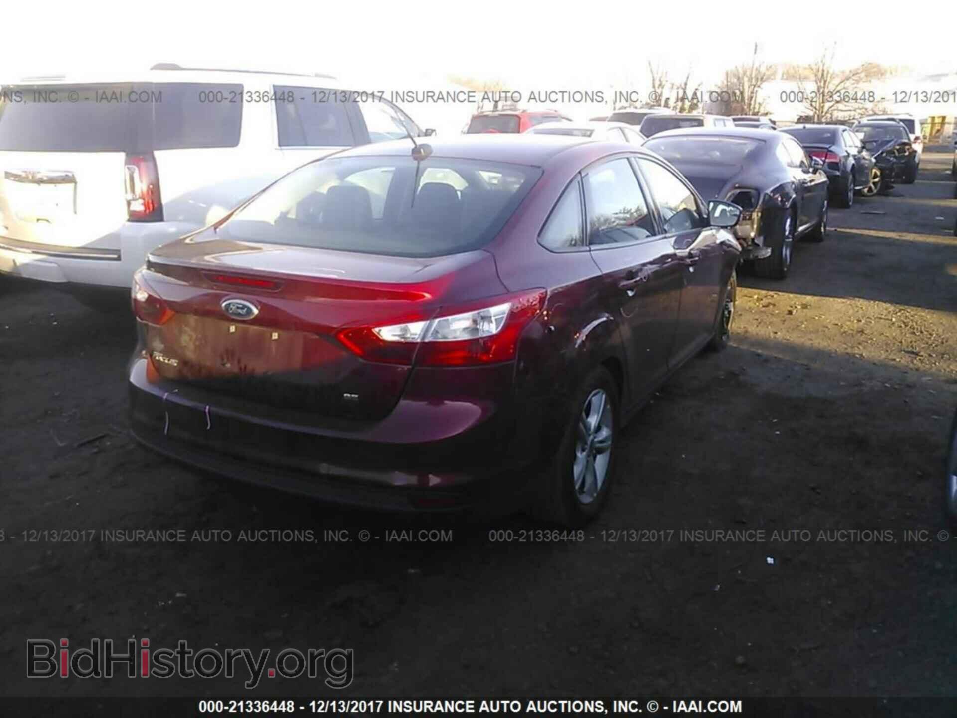 2014 Ford Focus - VIN: 1FADP3F25EL377572 - Фото 4