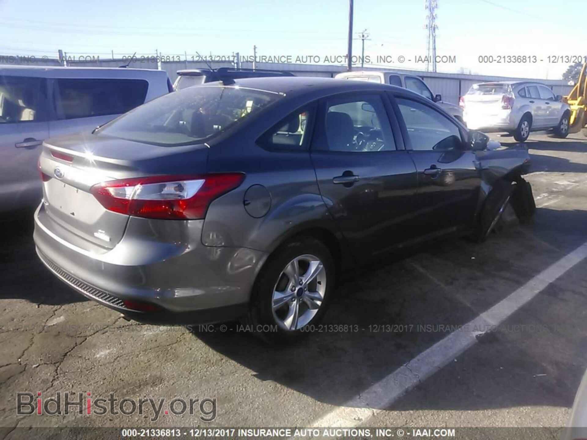 2014 Ford Focus - VIN: 1FADP3F26EL322872 - Фото 4