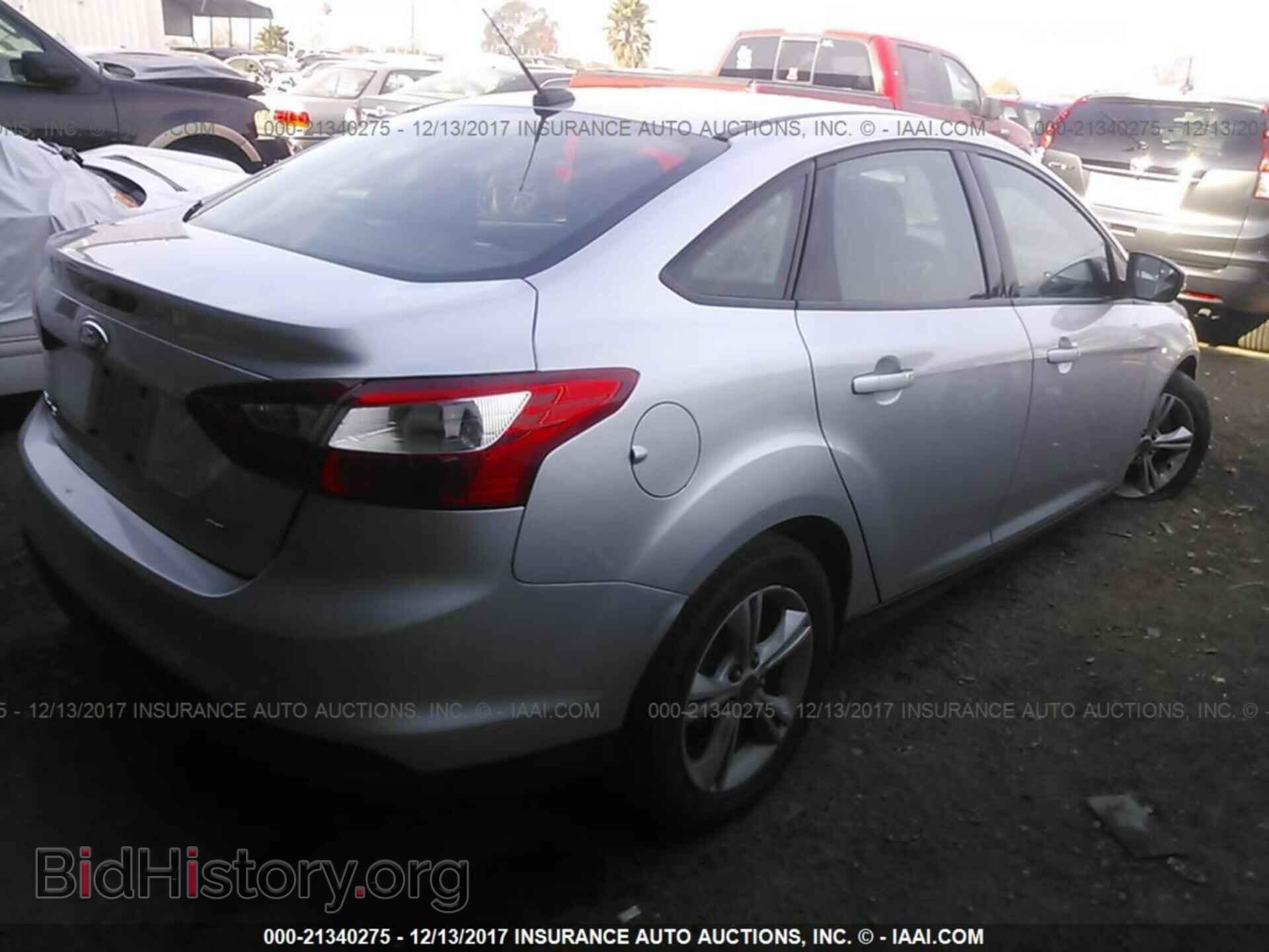 2014 Ford Focus - VIN: 1FADP3F24EL432934 - Photo 4