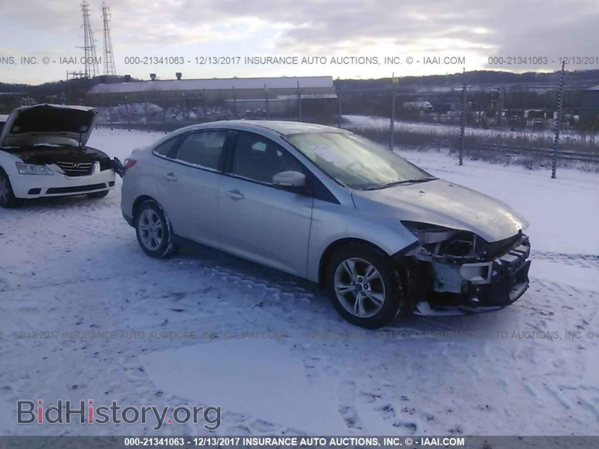 Photo 1FAHP3F25CL100323 - Ford Focus 2012