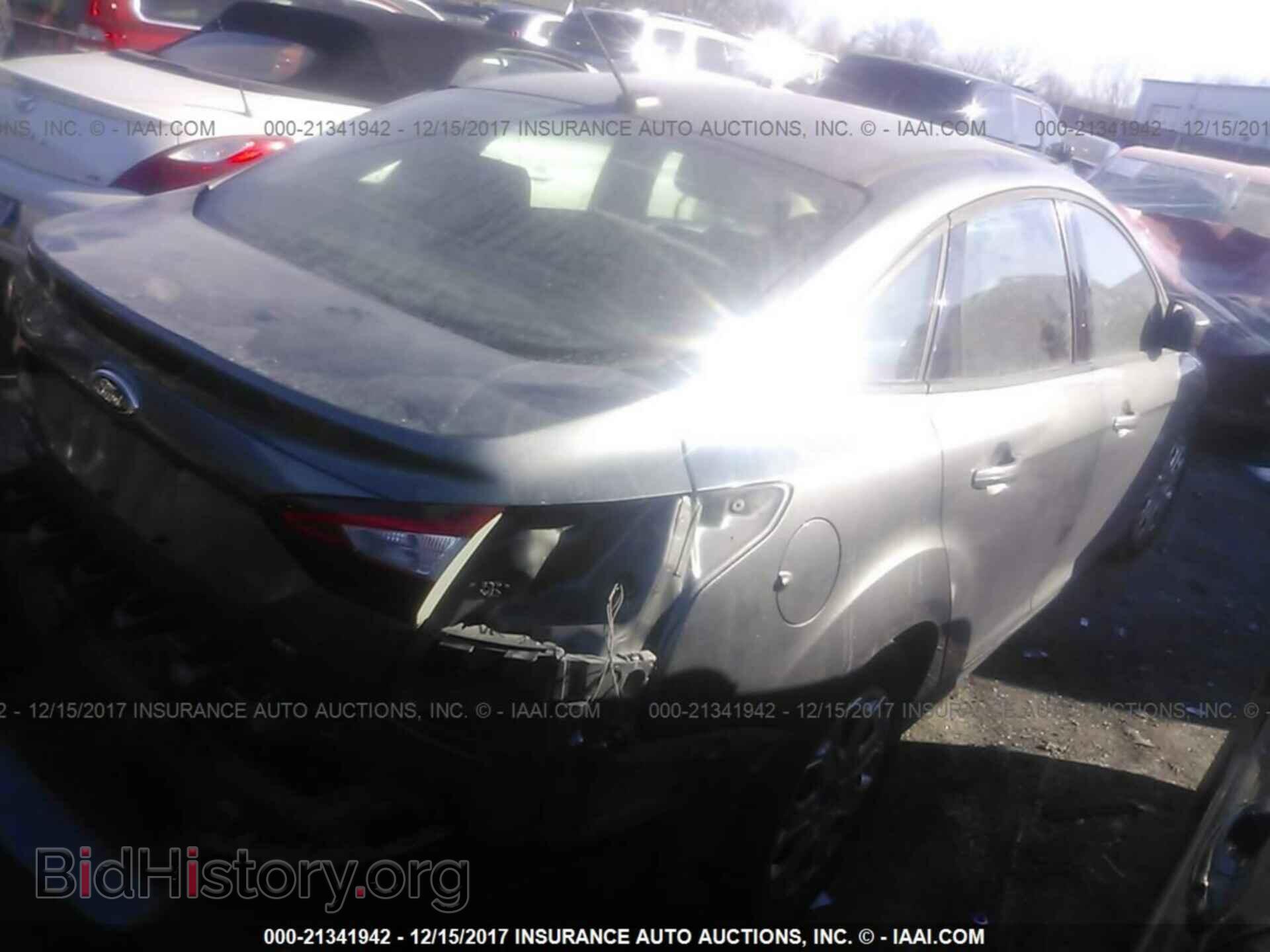 2012 Ford Focus - VIN: 1FAHP3F22CL355401 - Фото 4