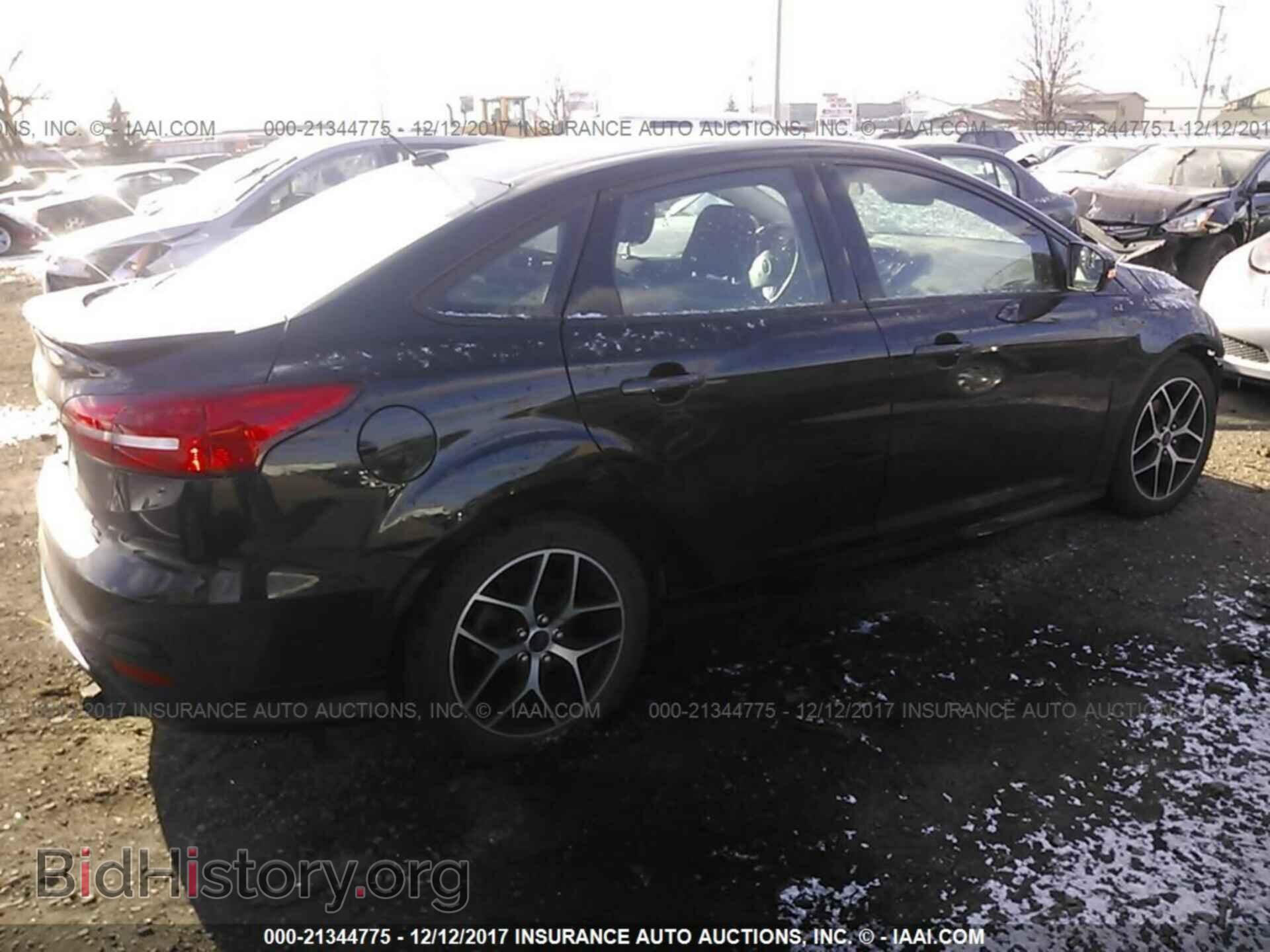 2015 Ford Focus - VIN: 1FADP3F24FL280185 - Photo 4