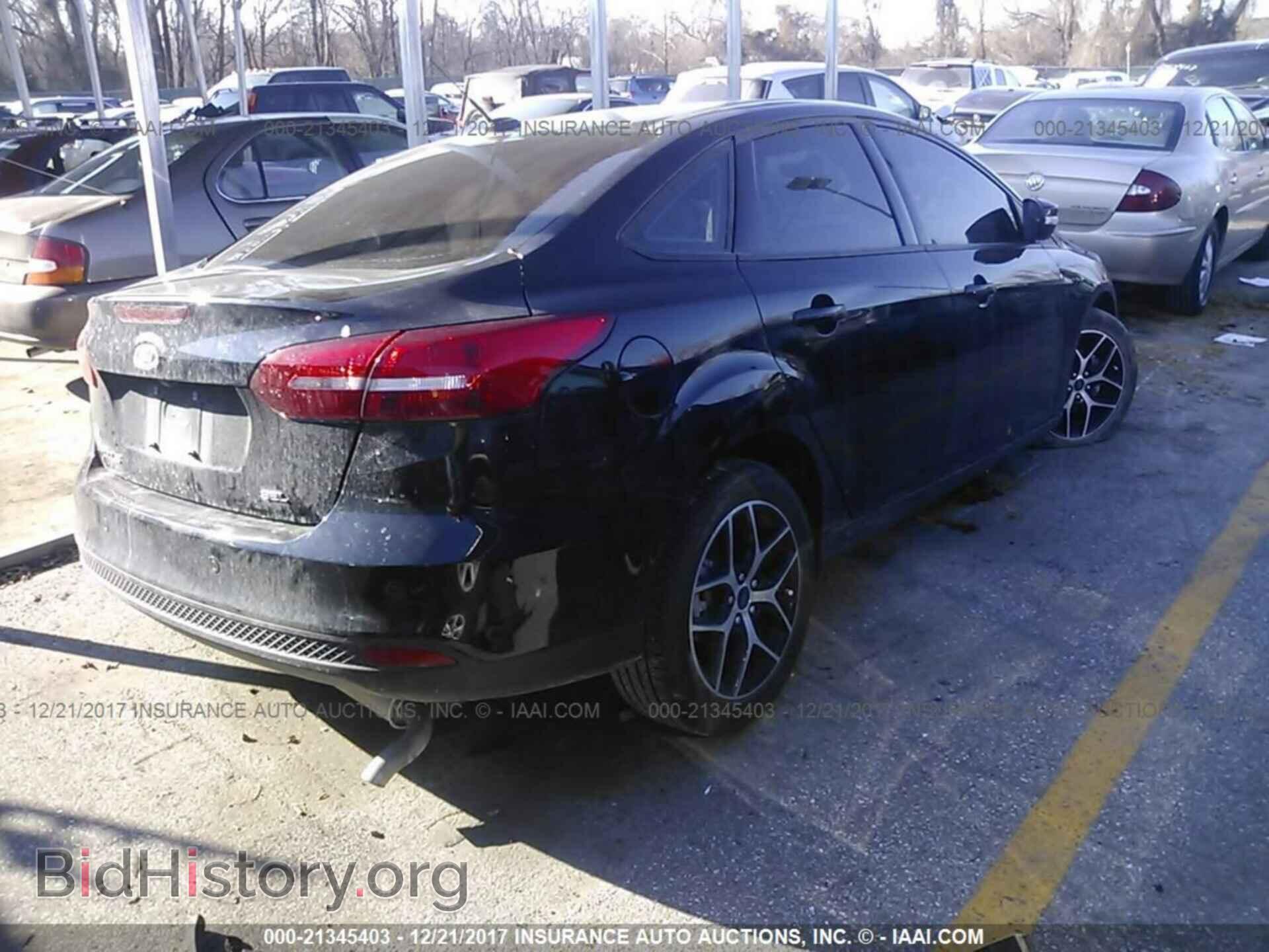 2017 Ford Focus - VIN: 1FADP3H21HL202611 - Photo 4