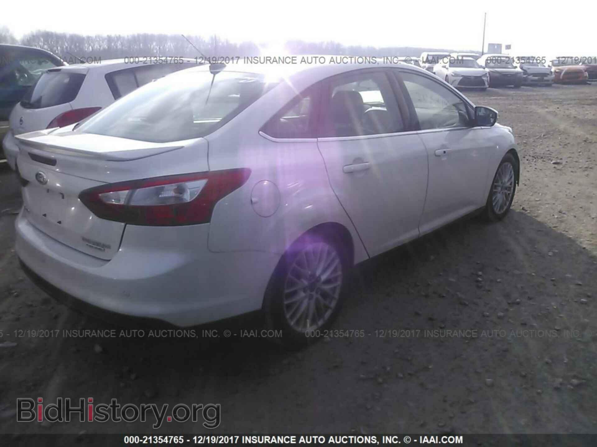 2014 Ford Focus - VIN: 1FADP3J23EL206410 - Photo 4