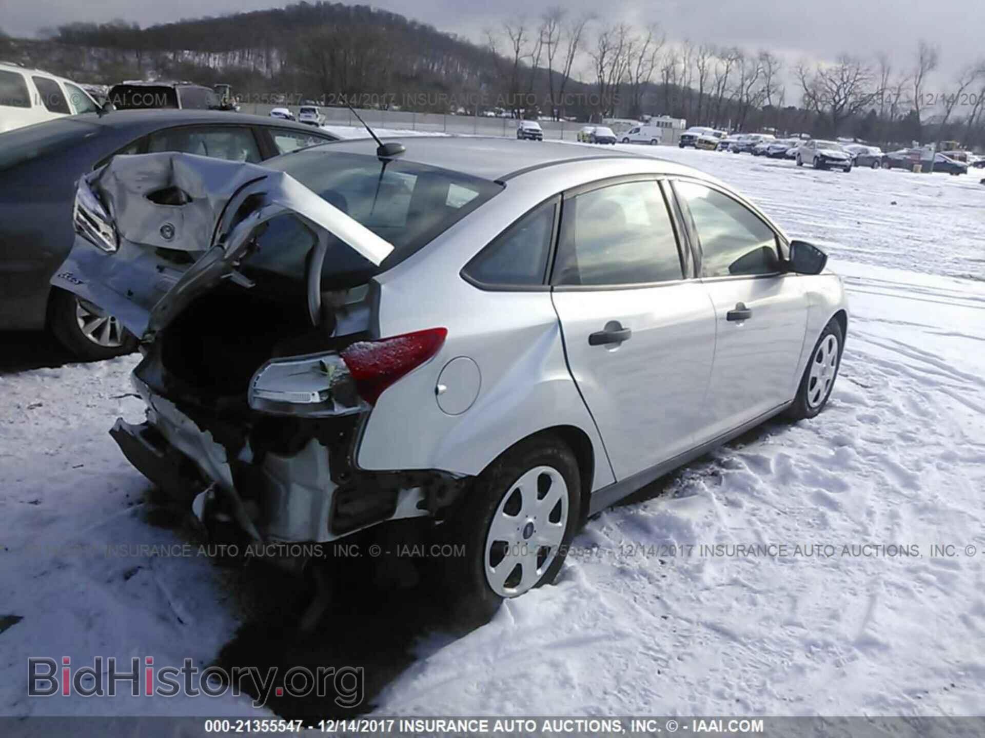 2016 Ford Focus - VIN: 1FADP3E26GL211503 - Photo 4