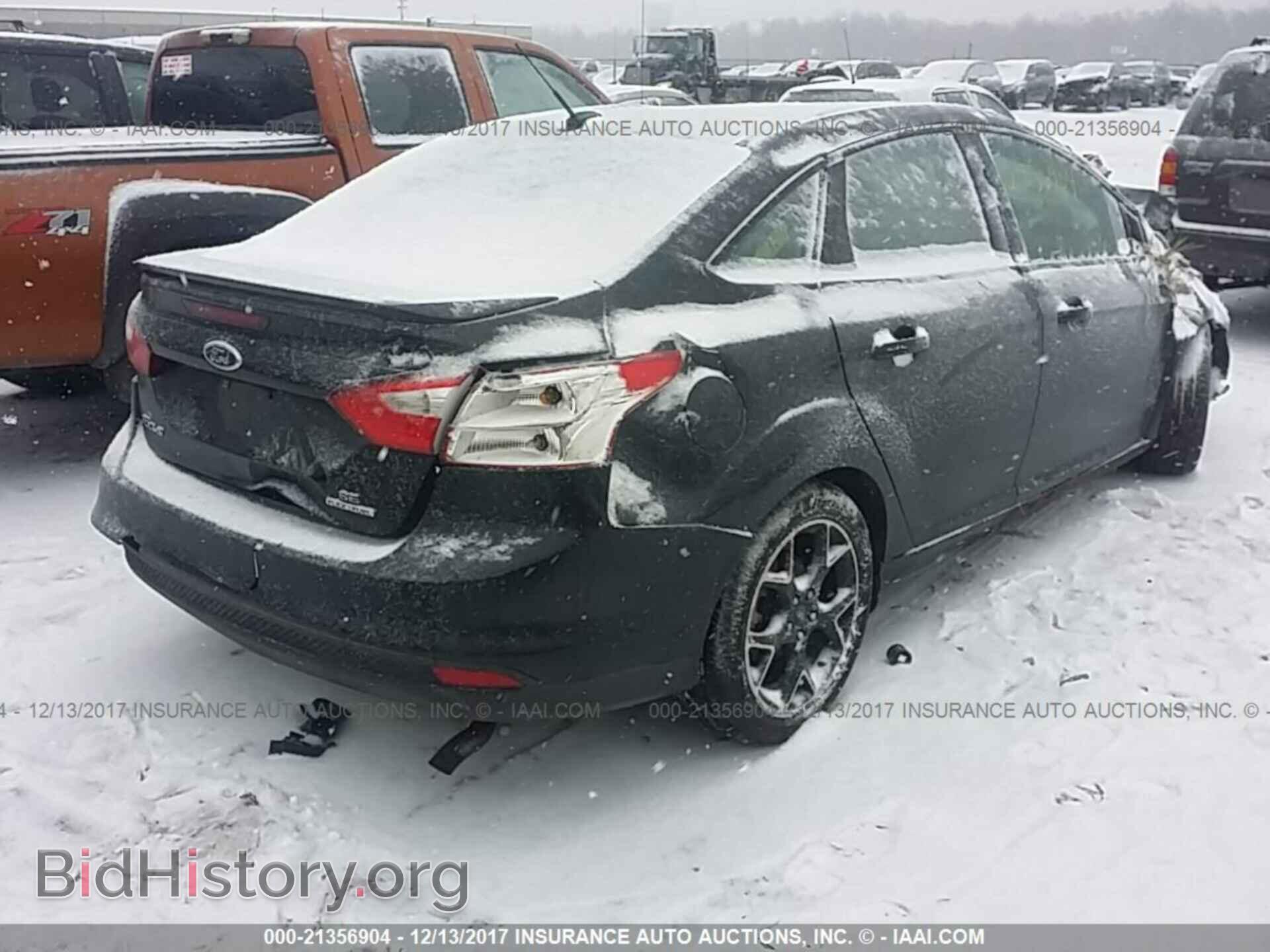2013 Ford Focus - VIN: 1FADP3F22DL380802 - Photo 4