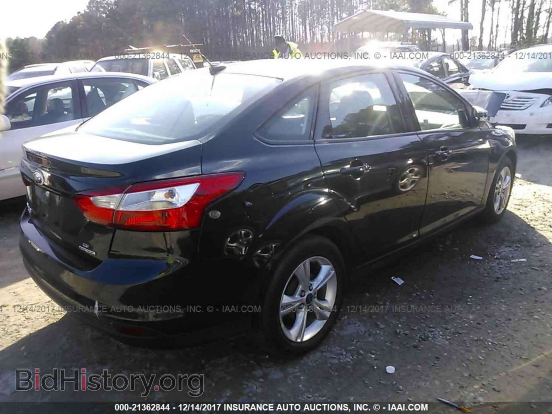 2014 Ford Focus - VIN: 1FADP3F29EL346325 - Photo 4