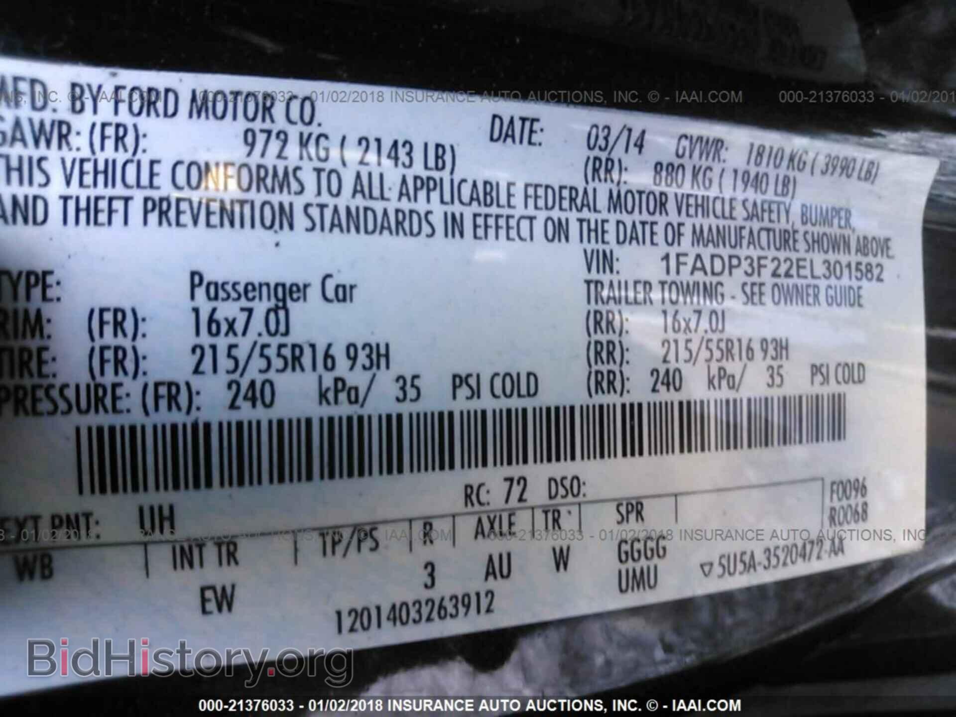 2014 Ford Focus - VIN: 1FADP3F22EL301582 - Photo 9