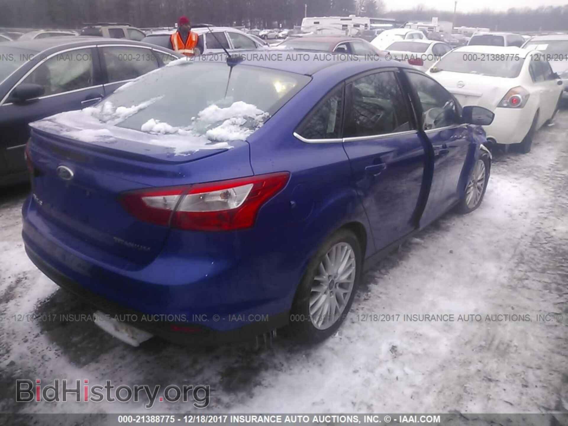2014 Ford Focus - VIN: 1FADP3J2XEL344574 - Фото 4
