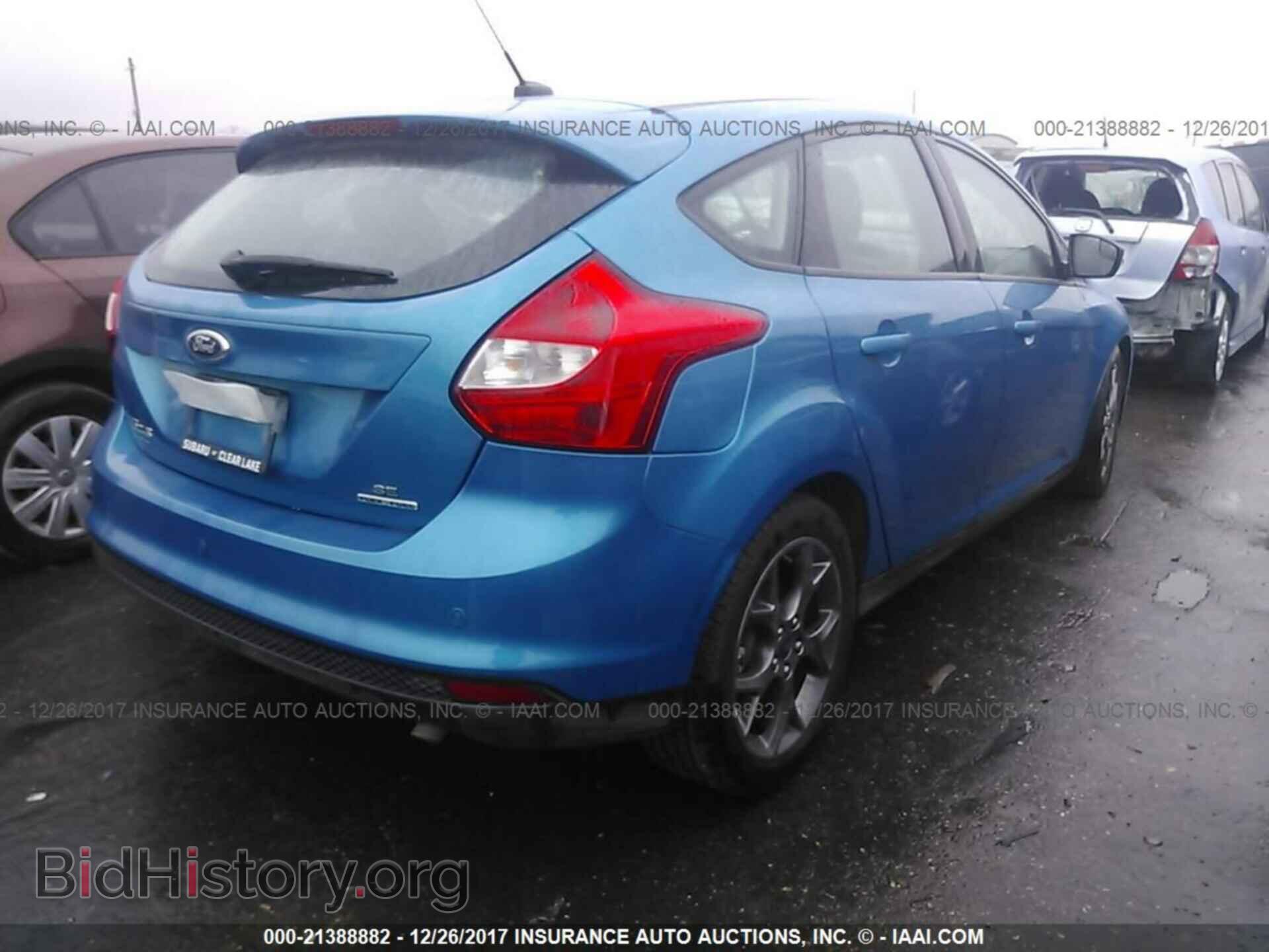 2014 Ford Focus - VIN: 1FADP3K21EL406331 - Photo 4