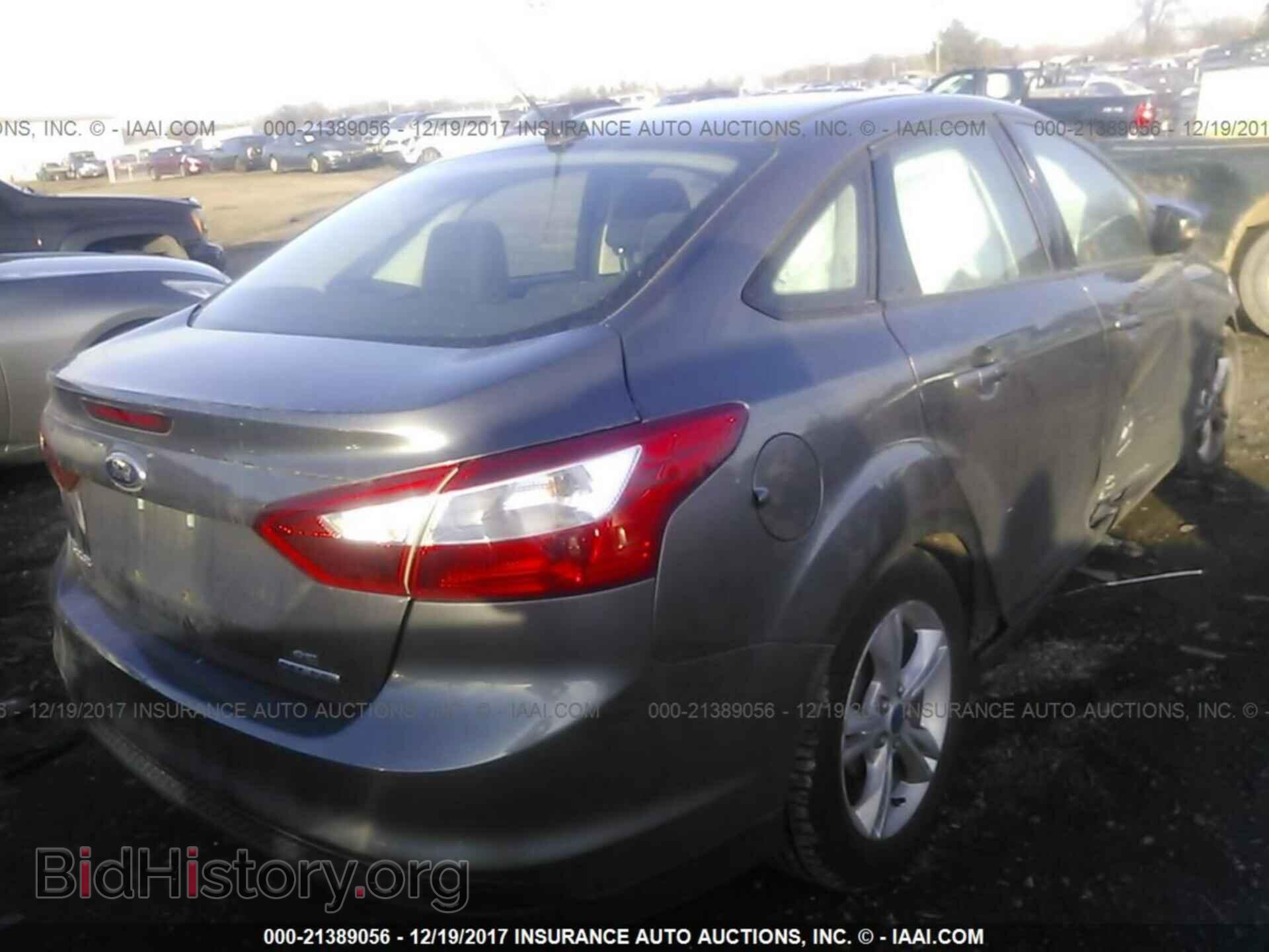2014 Ford Focus - VIN: 1FADP3F22EL244736 - Фото 4