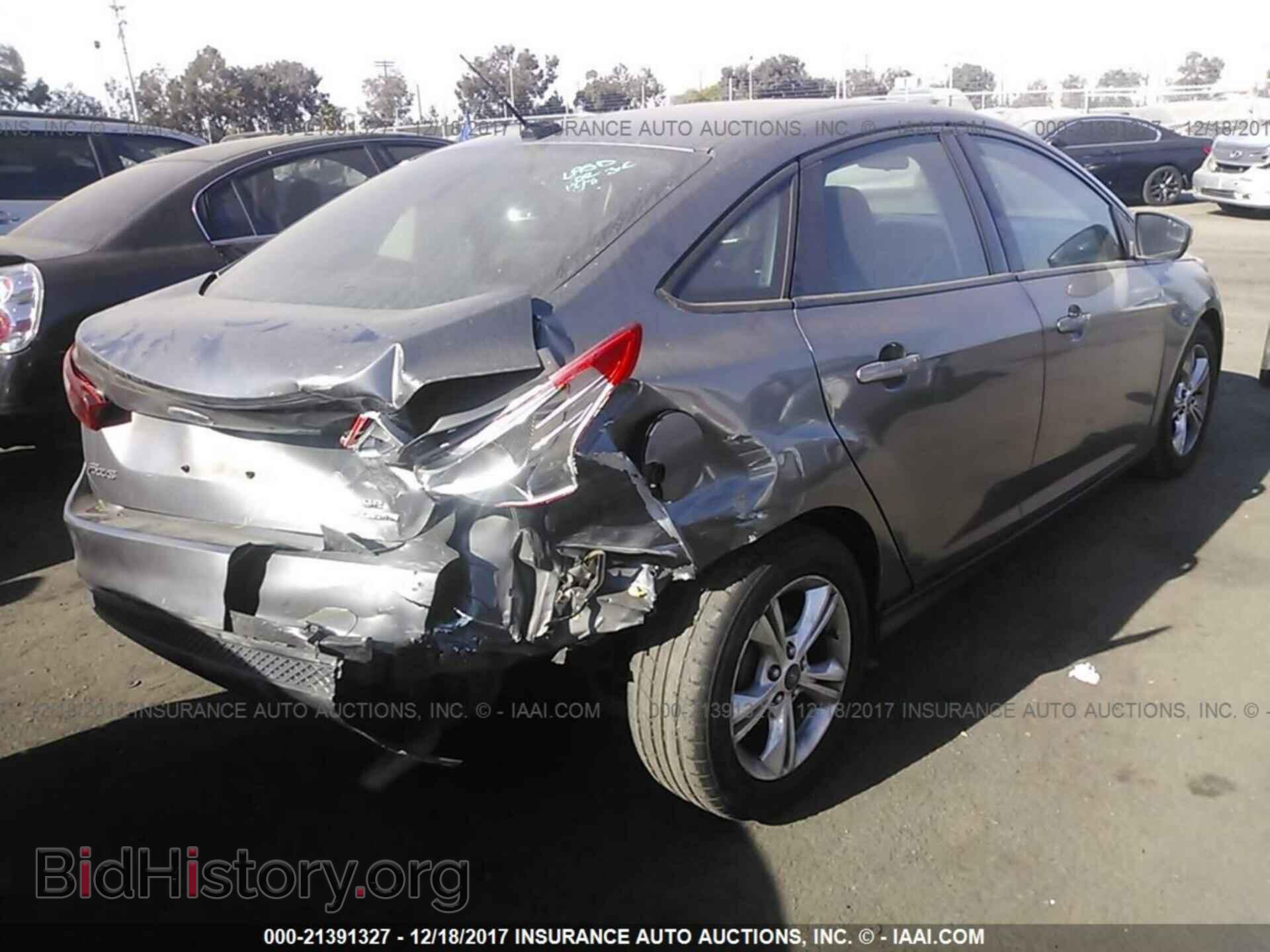2013 Ford Focus - VIN: 1FADP3F24DL314557 - Фото 4