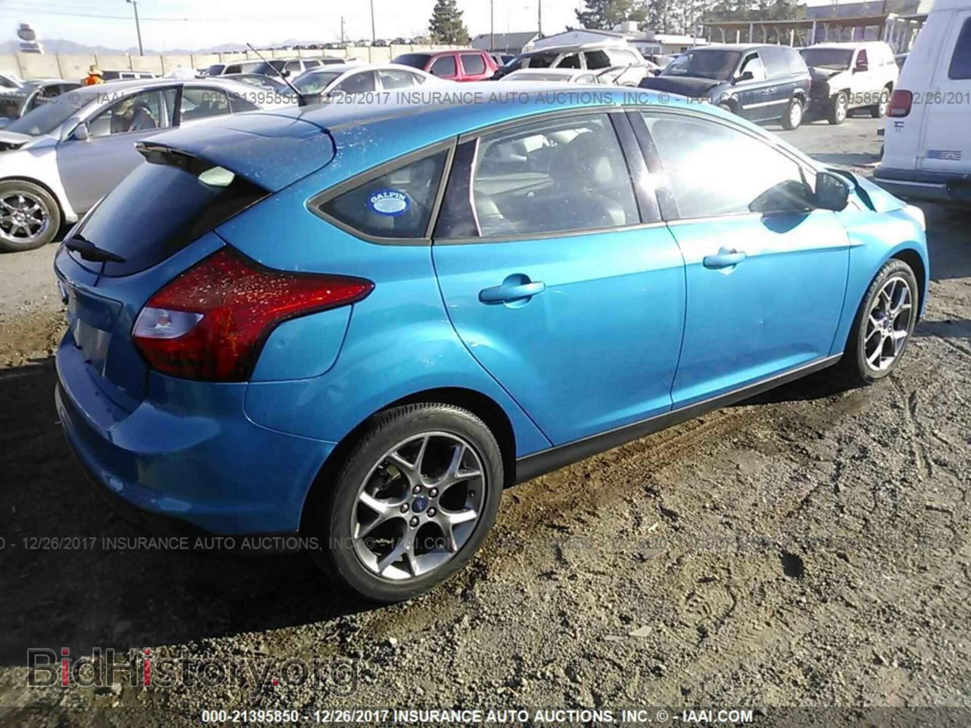 2013 Ford Focus - VIN: 1FADP3K21DL251679 - Photo 4